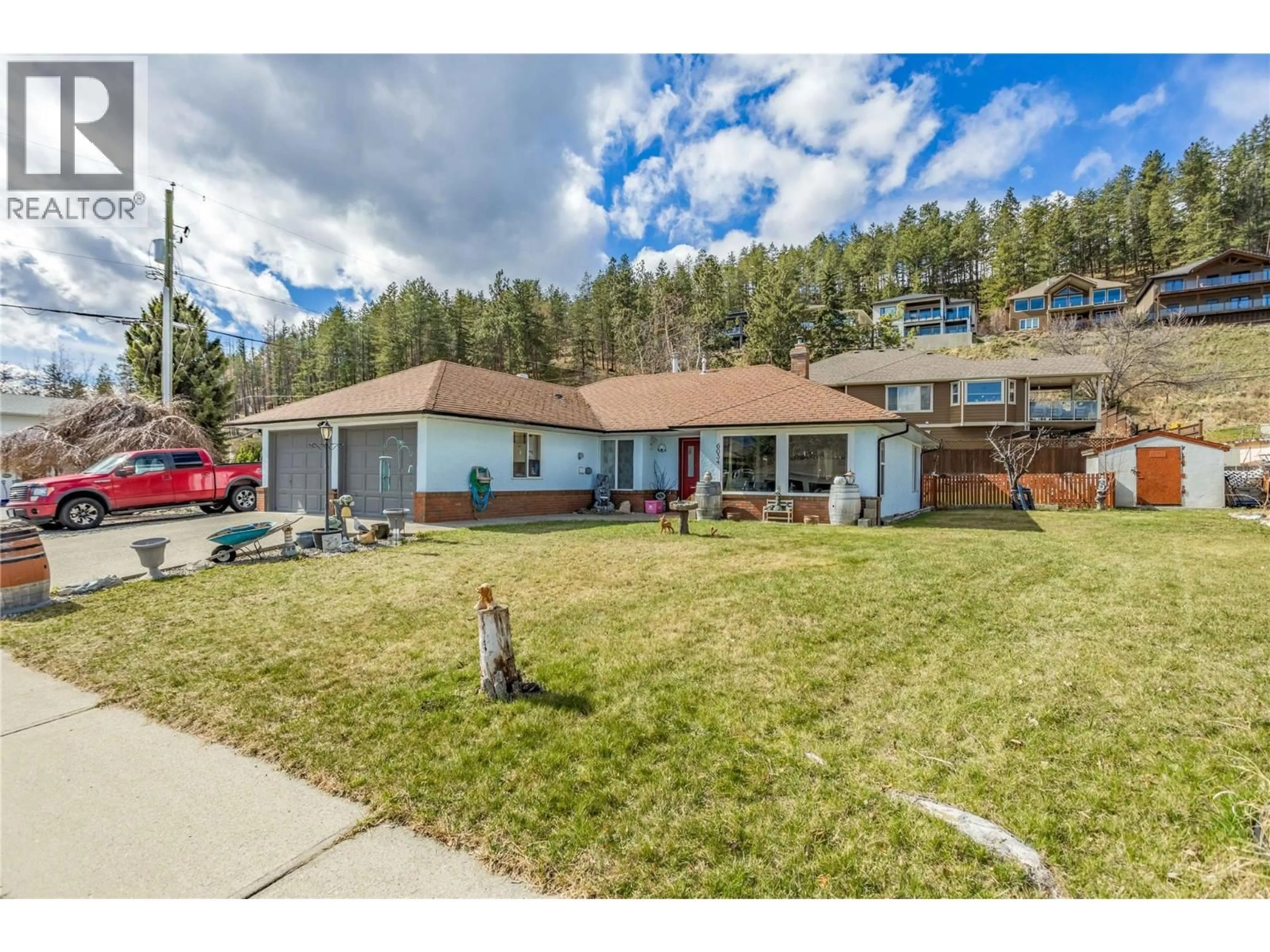 A pic from outside/outdoor area/front of a property/back of a property/a pic from drone, mountain view for 6034 GARRAWAY PLACE, Peachland British Columbia V0H1X4