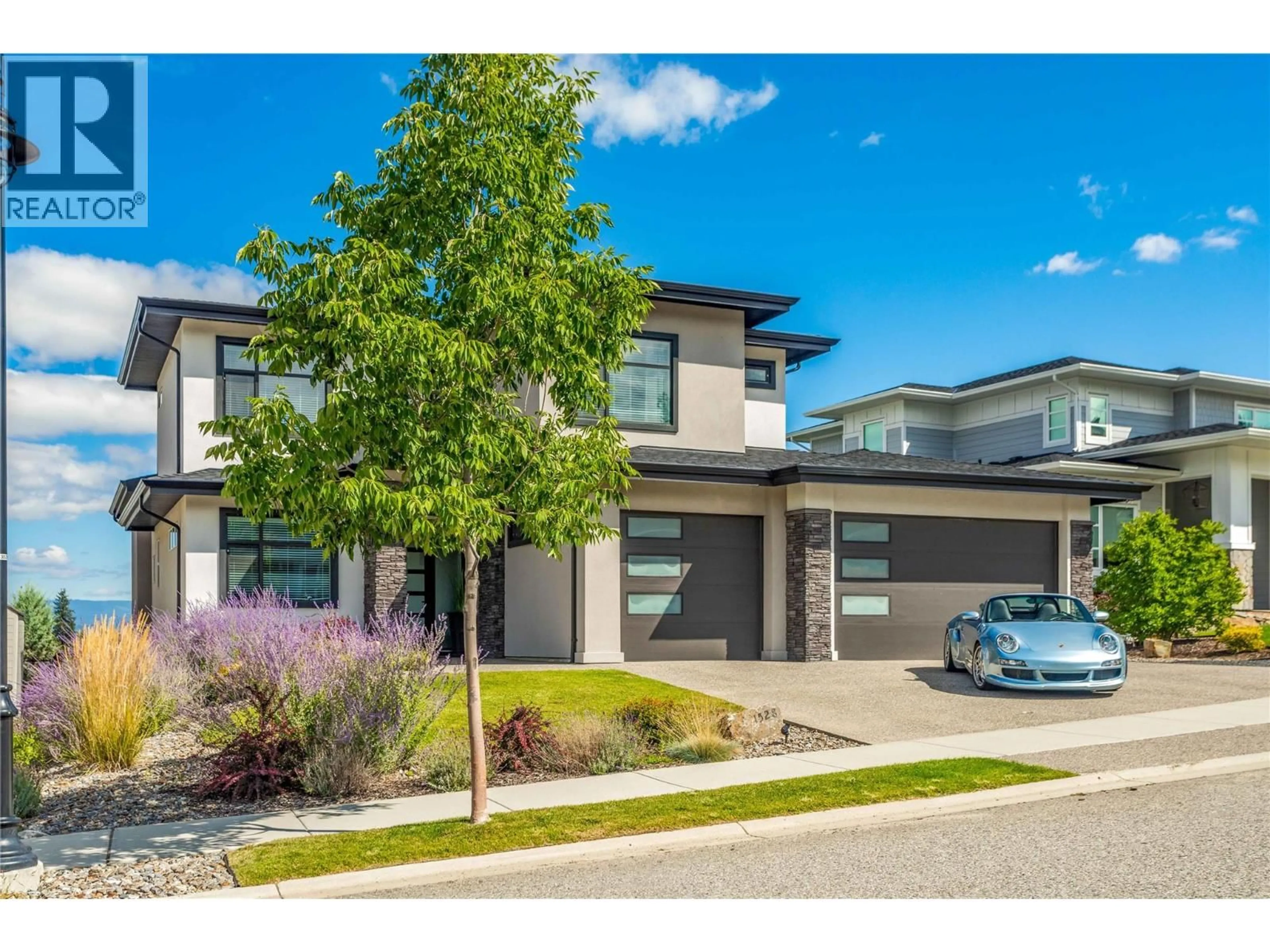 A pic from outside/outdoor area/front of a property/back of a property/a pic from drone, street for 1528 FAWN RUN DRIVE, Kelowna British Columbia V1W5L3