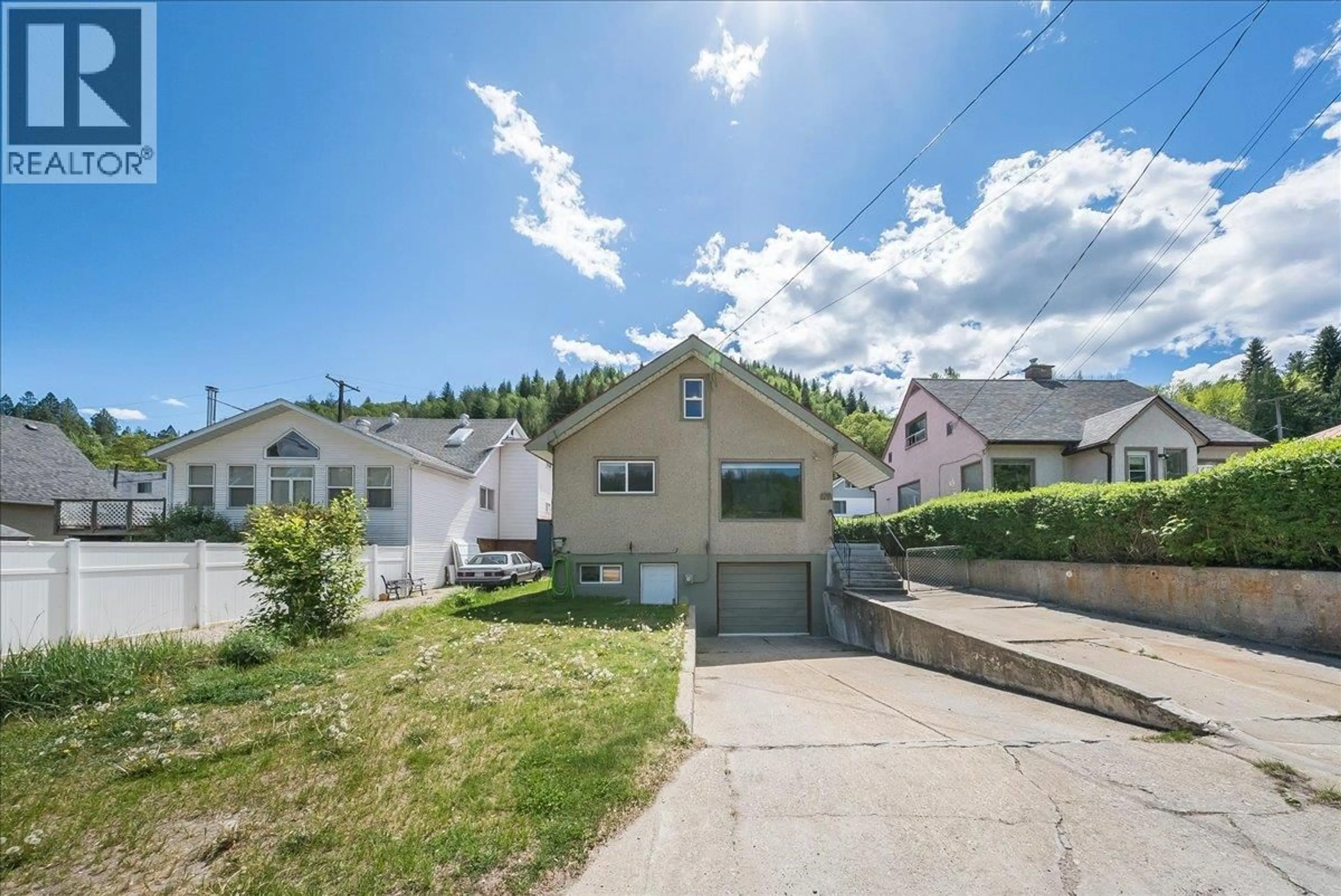 A pic from outside/outdoor area/front of a property/back of a property/a pic from drone, street for 128 HAIG STREET, Warfield British Columbia V1R2L9