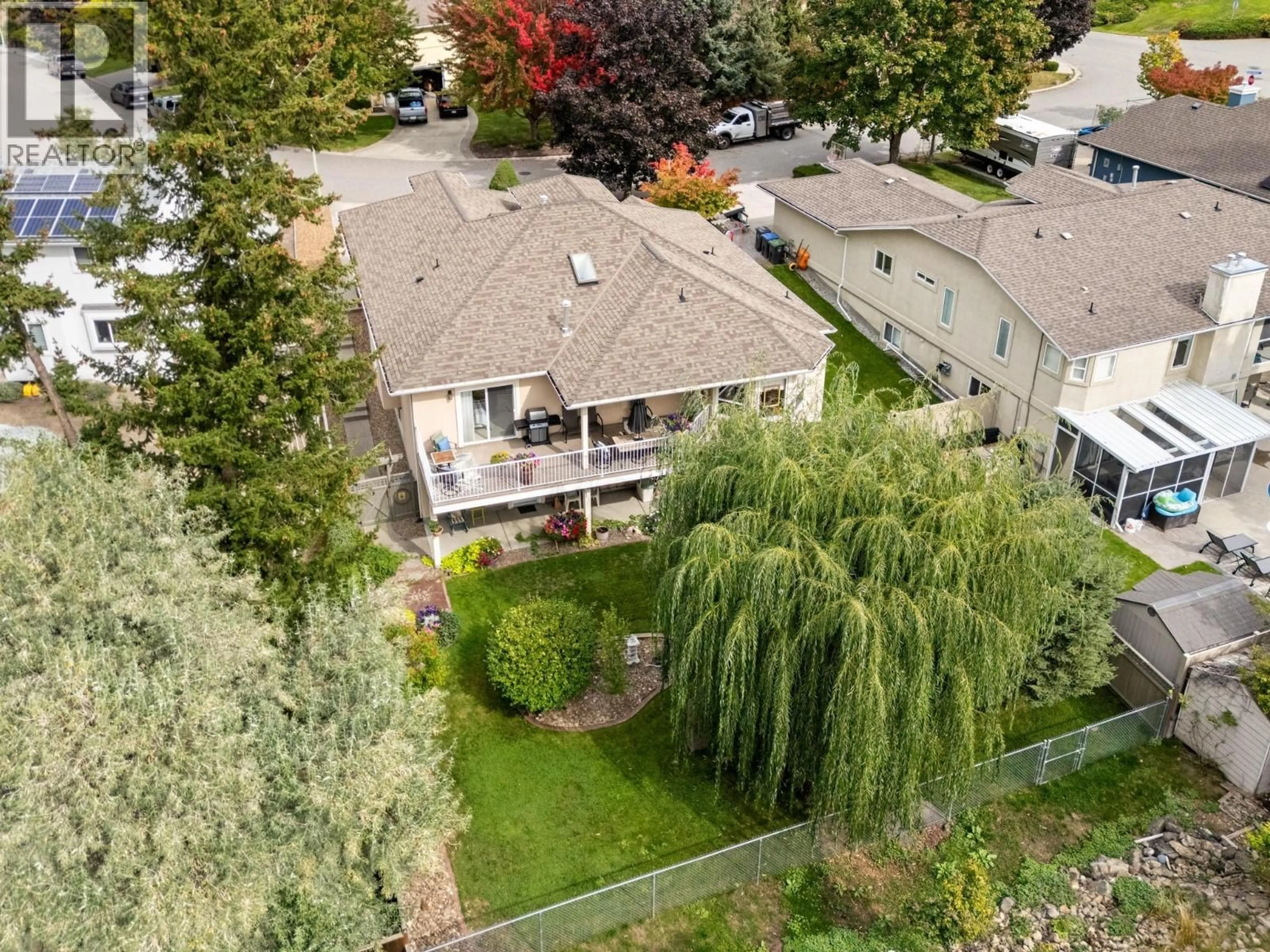 A pic from outside/outdoor area/front of a property/back of a property/a pic from drone, unknown for 294 KNIGHTSBRIDGE WAY, Kelowna British Columbia V1V2A9