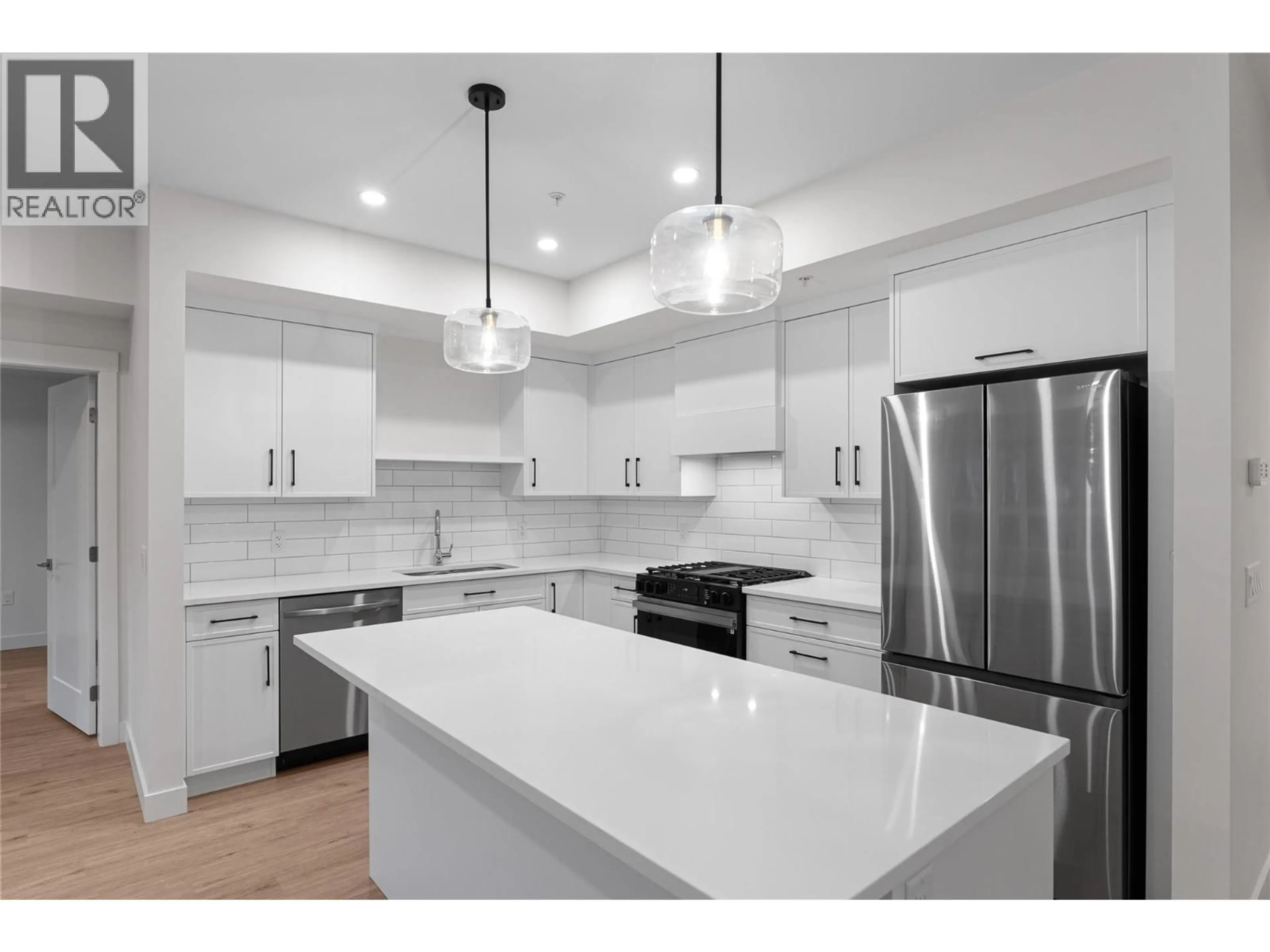 Open concept kitchen, ceramic/tile floor for 308 - 1844 QU'APPELLE BOULEVARD, Kamloops British Columbia V2E0E8
