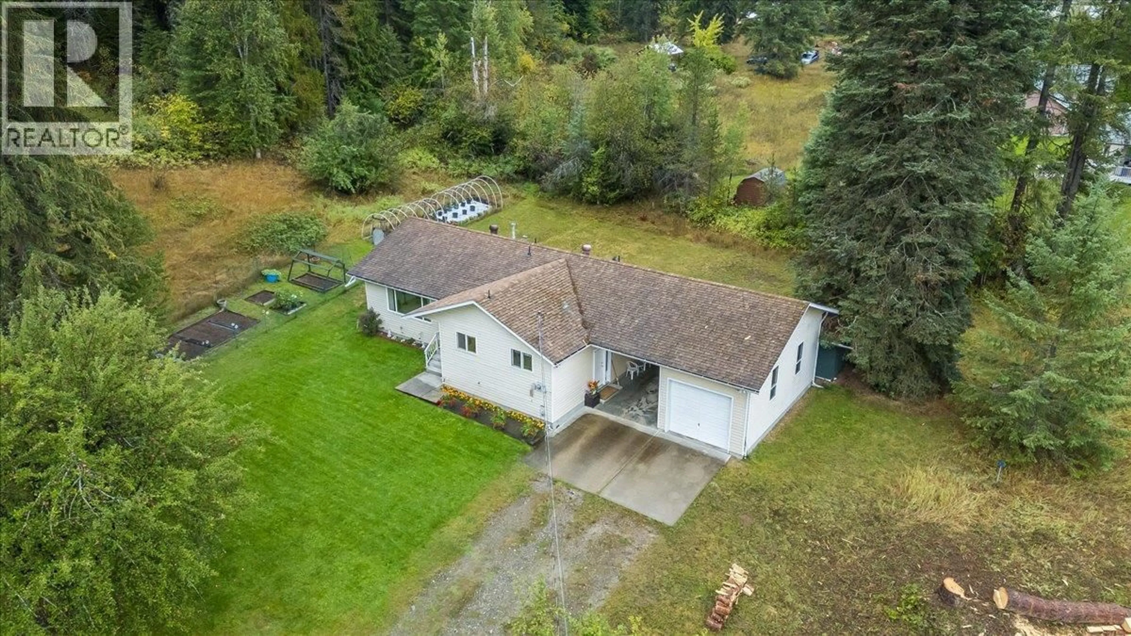 A pic from outside/outdoor area/front of a property/back of a property/a pic from drone, unknown for 1764 GREEN ROAD, Fruitvale British Columbia V0G1L1