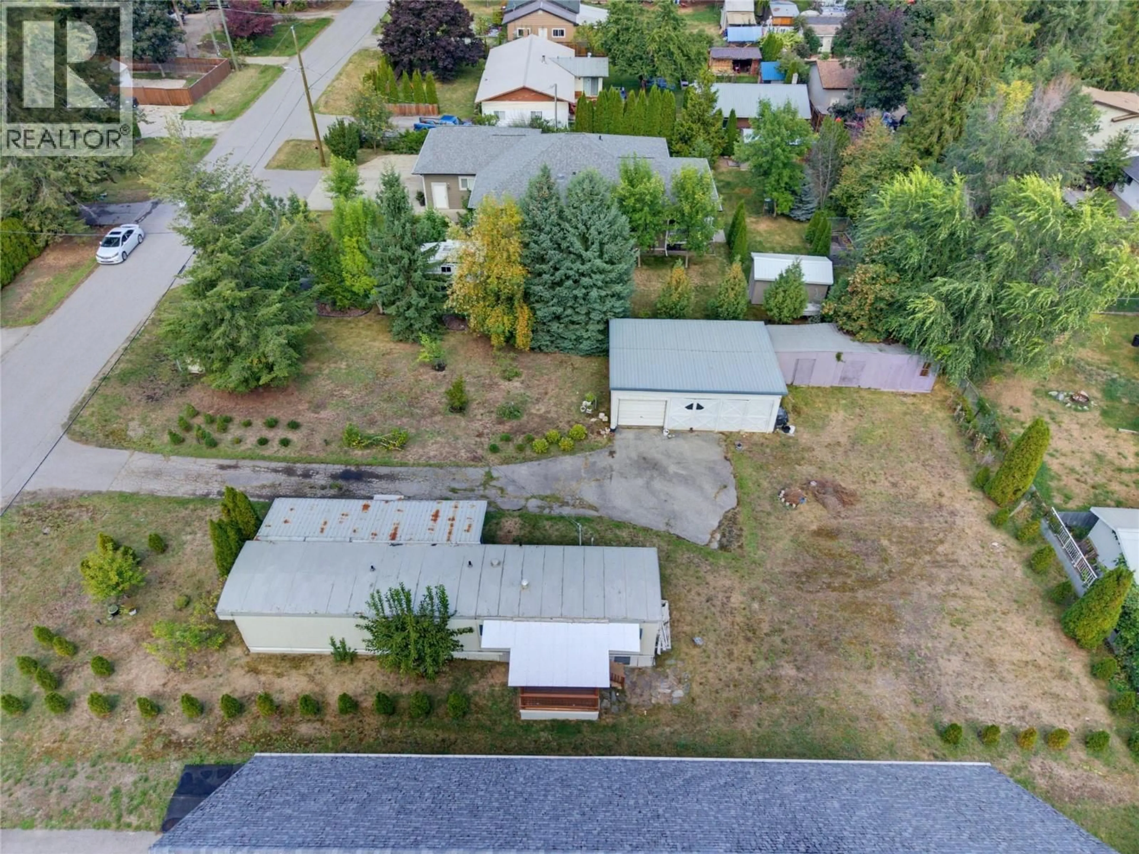 A pic from outside/outdoor area/front of a property/back of a property/a pic from drone, unknown for 405 GILLIS AVENUE, Sicamous British Columbia V0E2V1