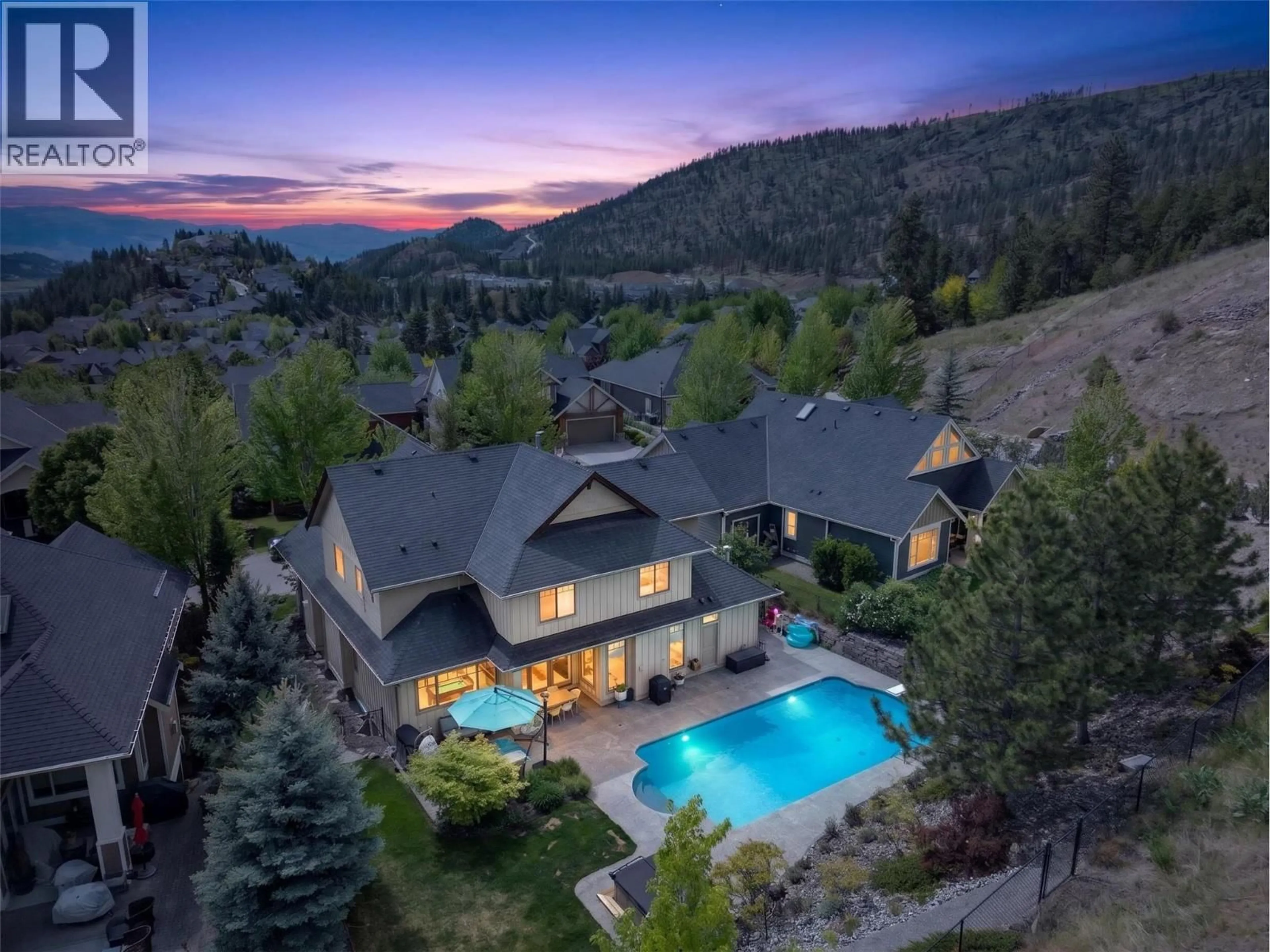 A pic from outside/outdoor area/front of a property/back of a property/a pic from drone, mountain view for 1996 TWIN RIDGE COURT, Kelowna British Columbia V1V2X8