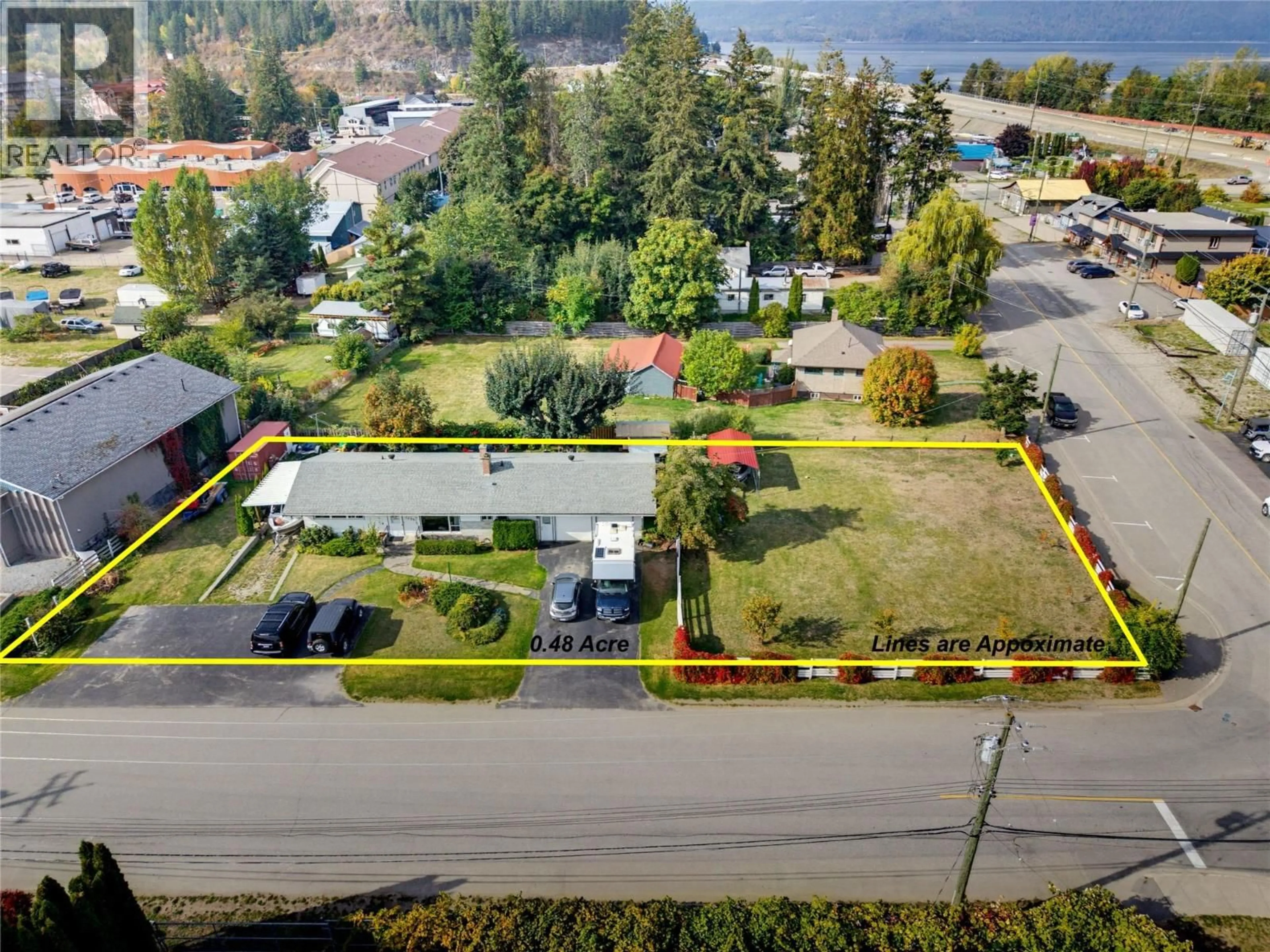 A pic from outside/outdoor area/front of a property/back of a property/a pic from drone, water/lake/river/ocean view for 1230 SHUSWAP AVENUE, Sicamous British Columbia V0E2V1