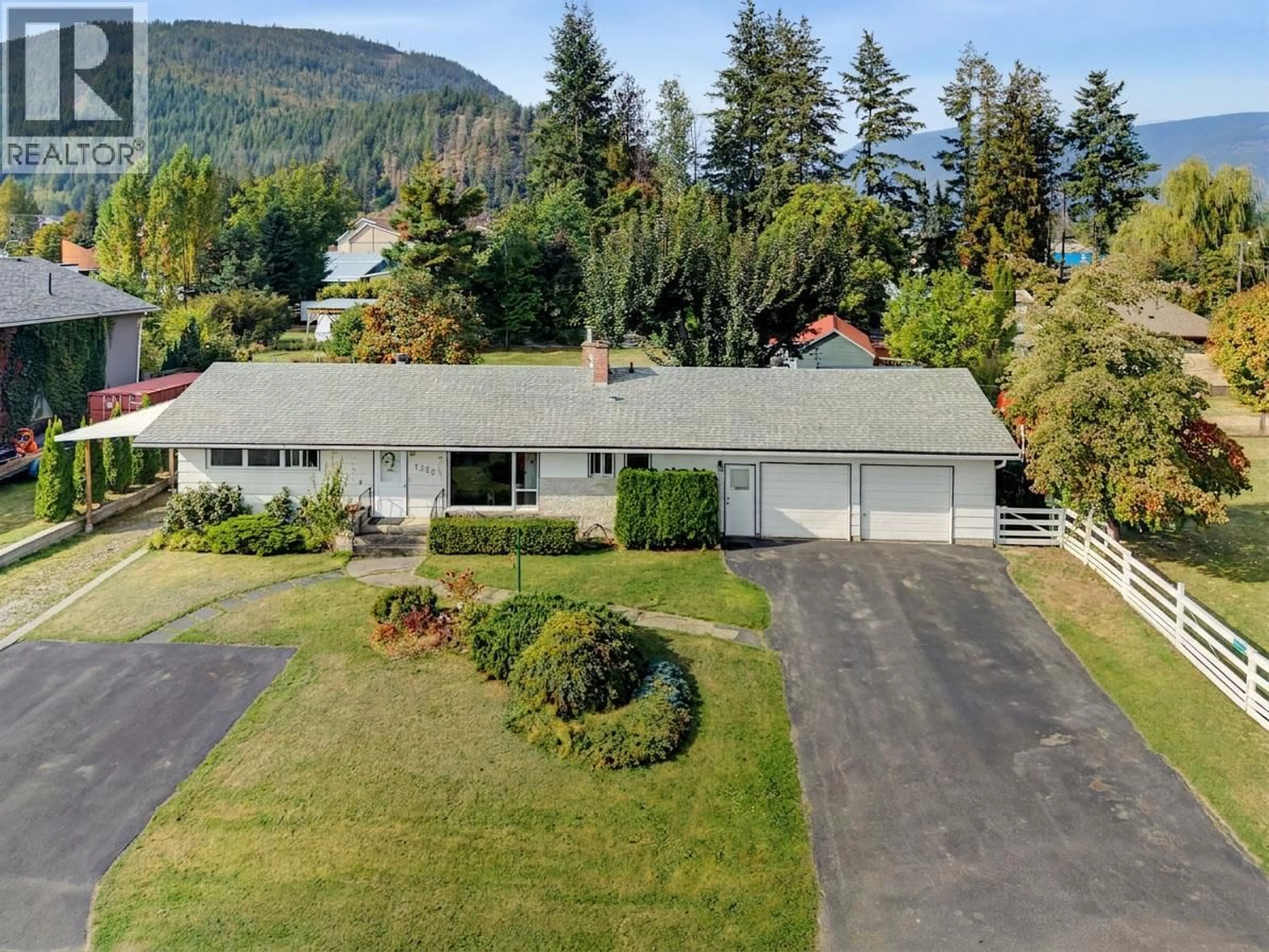 A pic from outside/outdoor area/front of a property/back of a property/a pic from drone, mountain view for 1230 SHUSWAP AVENUE, Sicamous British Columbia V0E2V1