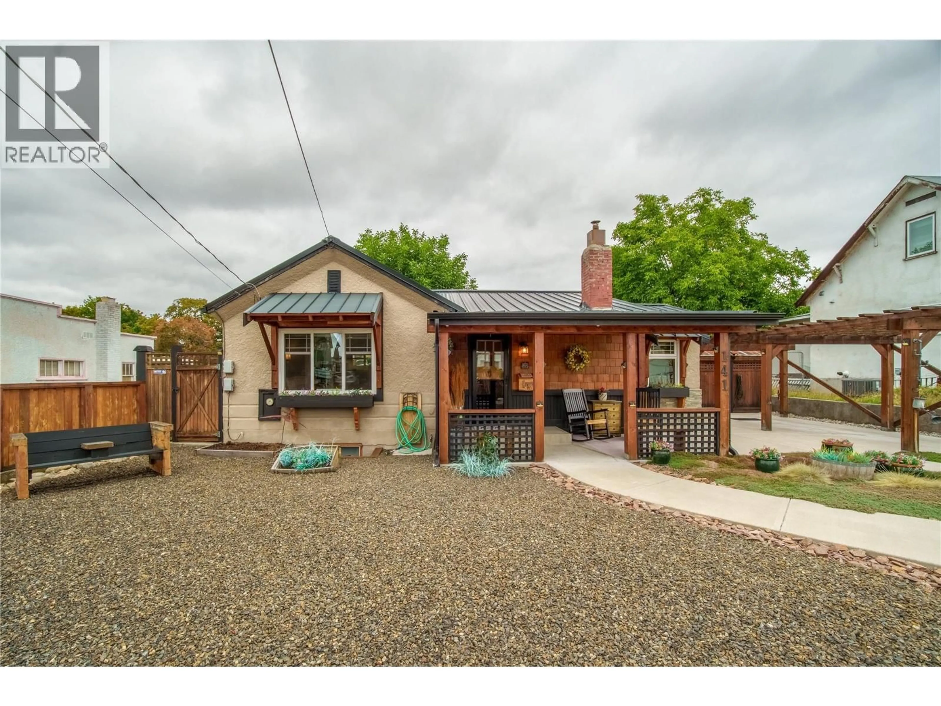 Home with brick exterior material, street for 141 REGINA AVENUE, Penticton British Columbia V2A2K7