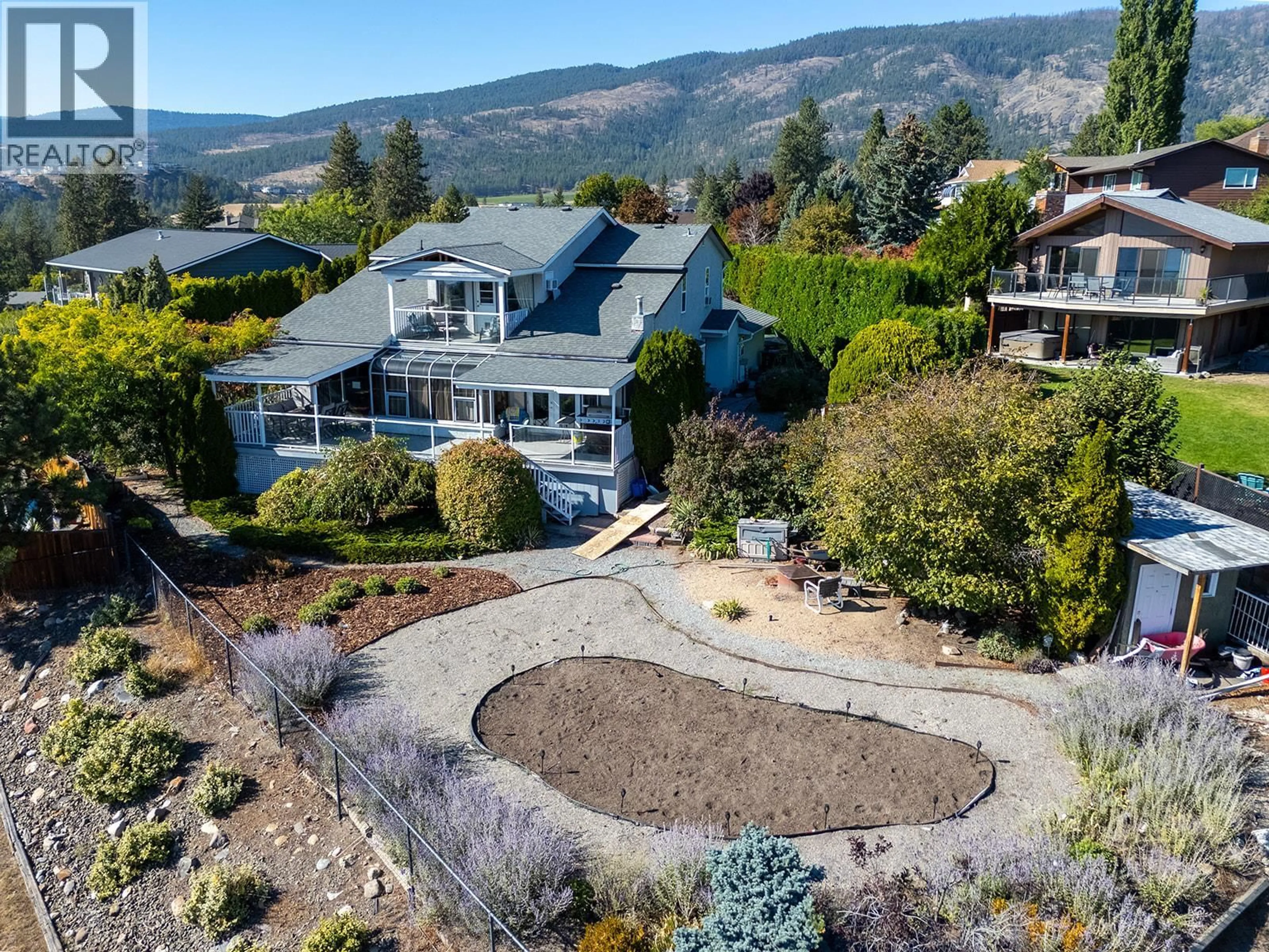 A pic from outside/outdoor area/front of a property/back of a property/a pic from drone, mountain view for 3219 SAGEBRUSH COURT, West Kelowna British Columbia V4T2G6