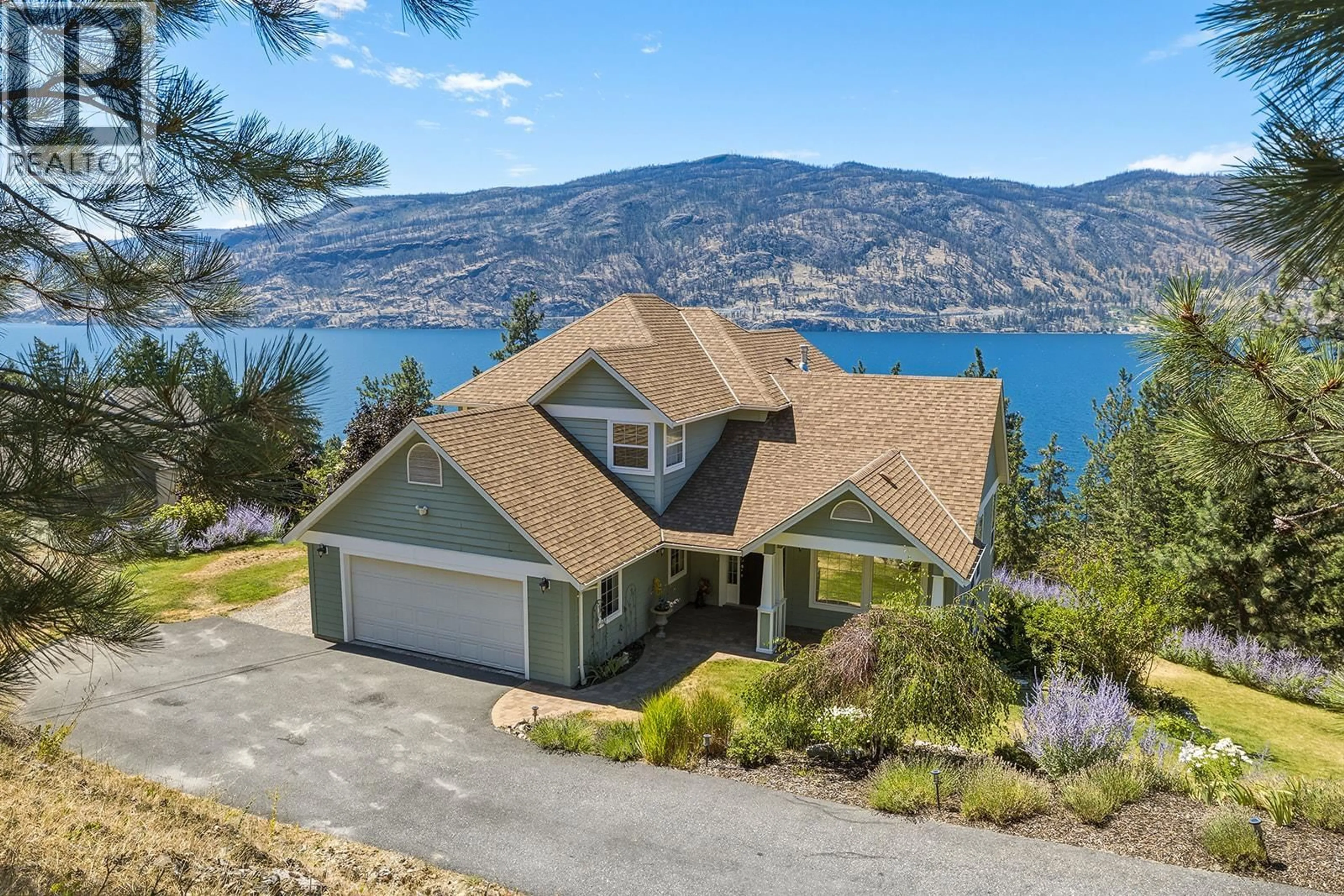 A pic from outside/outdoor area/front of a property/back of a property/a pic from drone, water/lake/river/ocean view for 2620 ARTHUR ROAD, Kelowna British Columbia V1V2B7