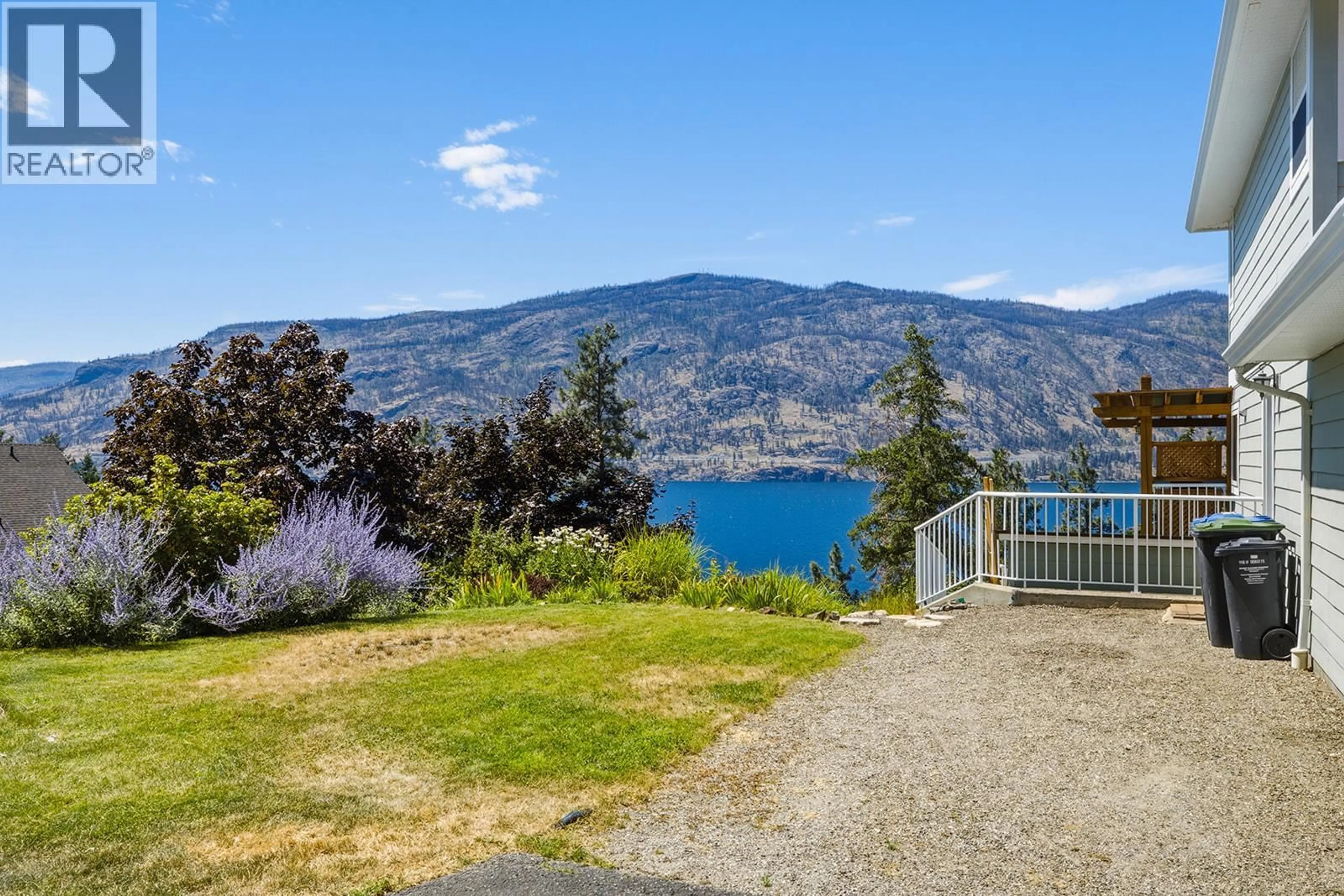 A pic from outside/outdoor area/front of a property/back of a property/a pic from drone, water/lake/river/ocean view for 2620 ARTHUR ROAD, Kelowna British Columbia V1V2B7