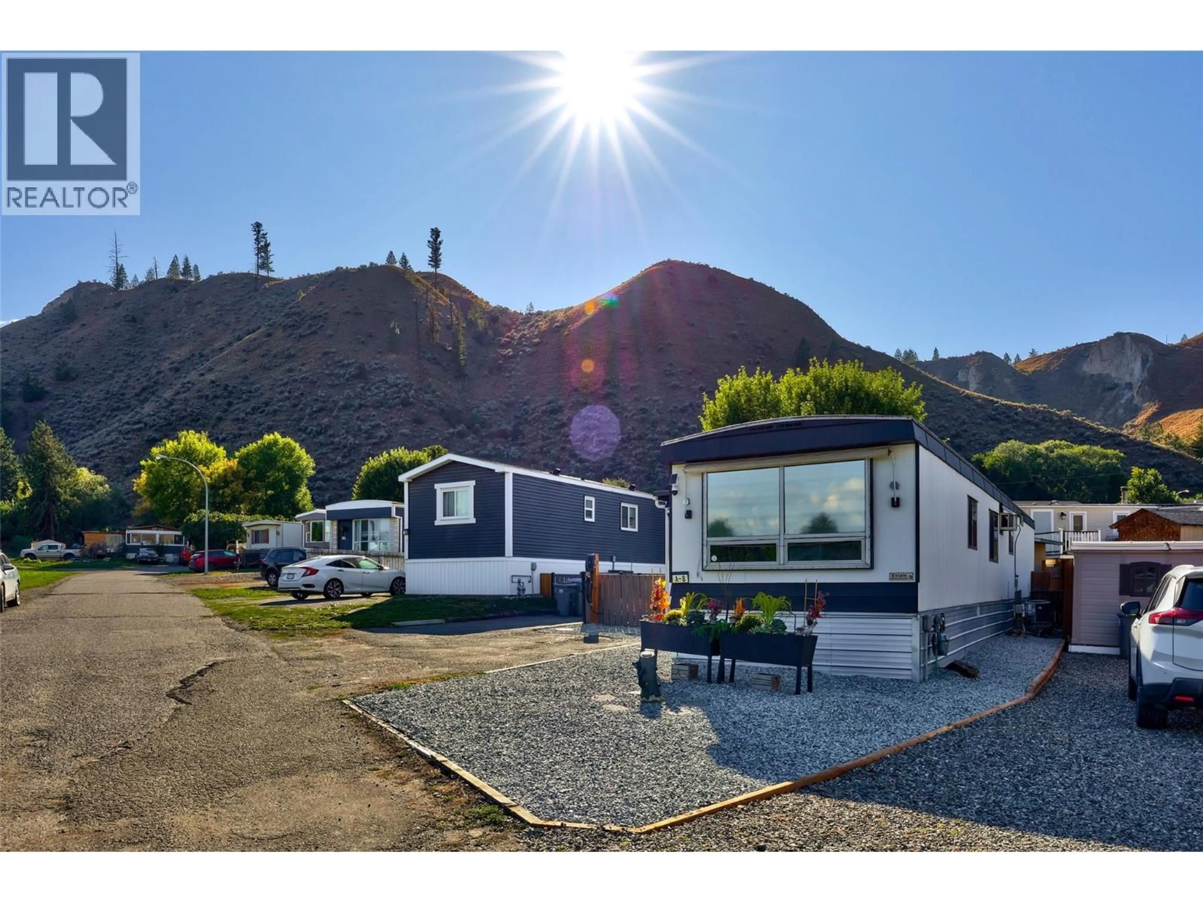 A pic from outside/outdoor area/front of a property/back of a property/a pic from drone, mountain view for A8 - 7155 DALLAS DRIVE, Kamloops British Columbia V2C4T1