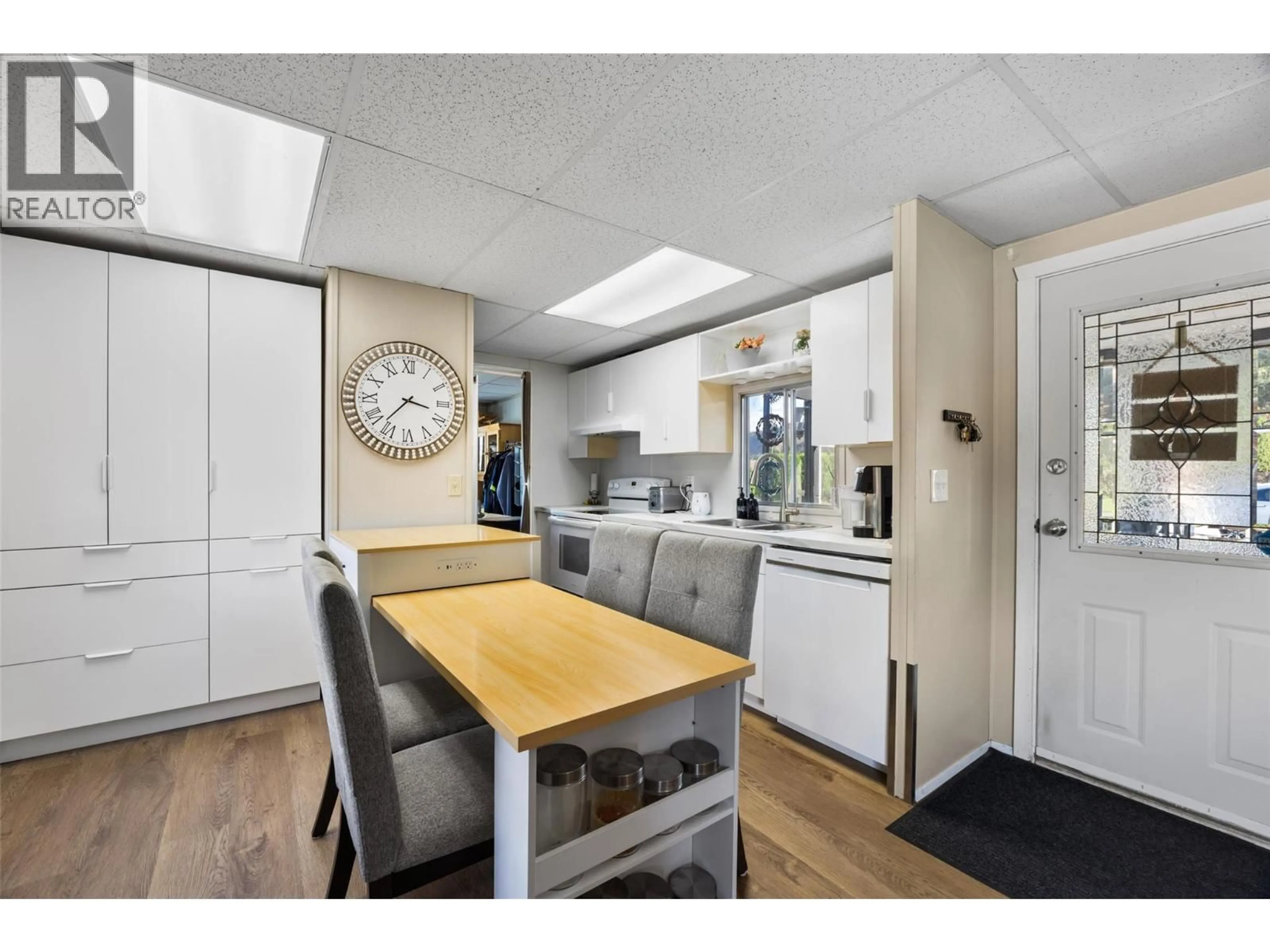 Open concept kitchen, wood/laminate floor for A8 - 7155 DALLAS DRIVE, Kamloops British Columbia V2C4T1