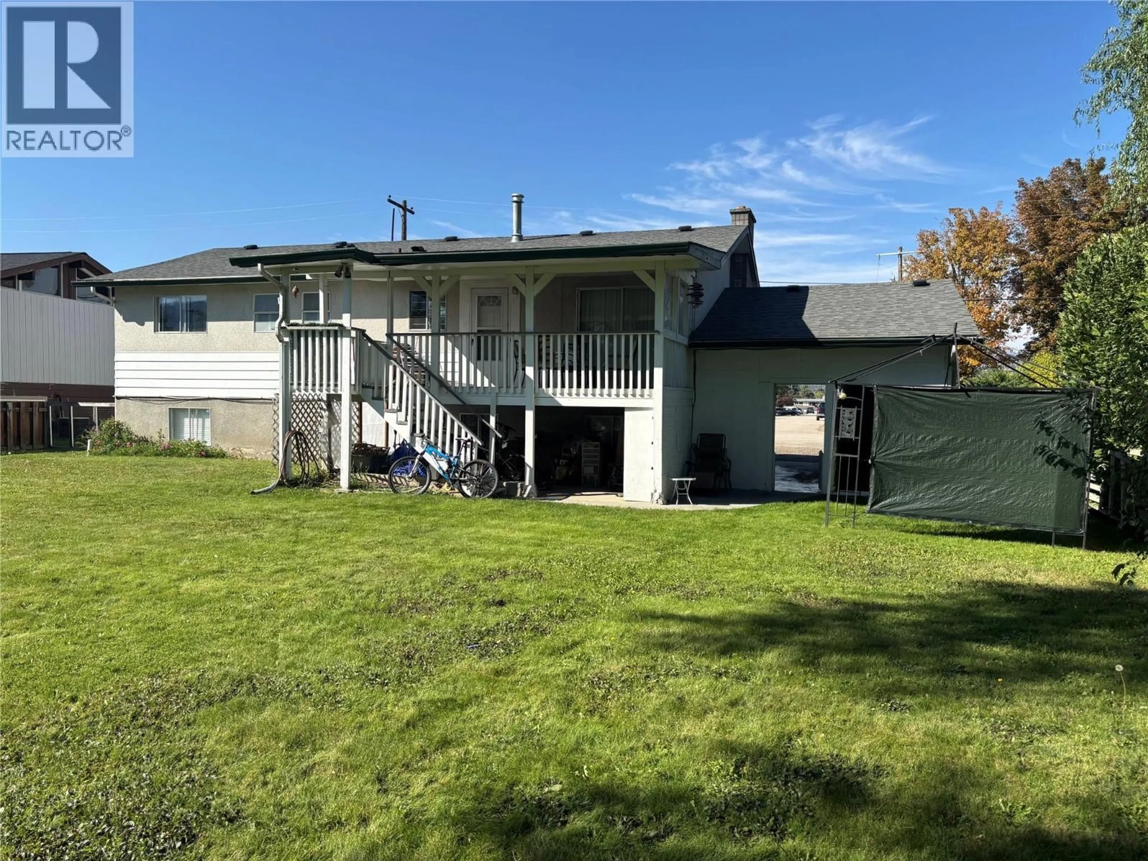 A pic from outside/outdoor area/front of a property/back of a property/a pic from drone, unknown for 645 PINETREE ROAD, Kelowna British Columbia V1X3G3