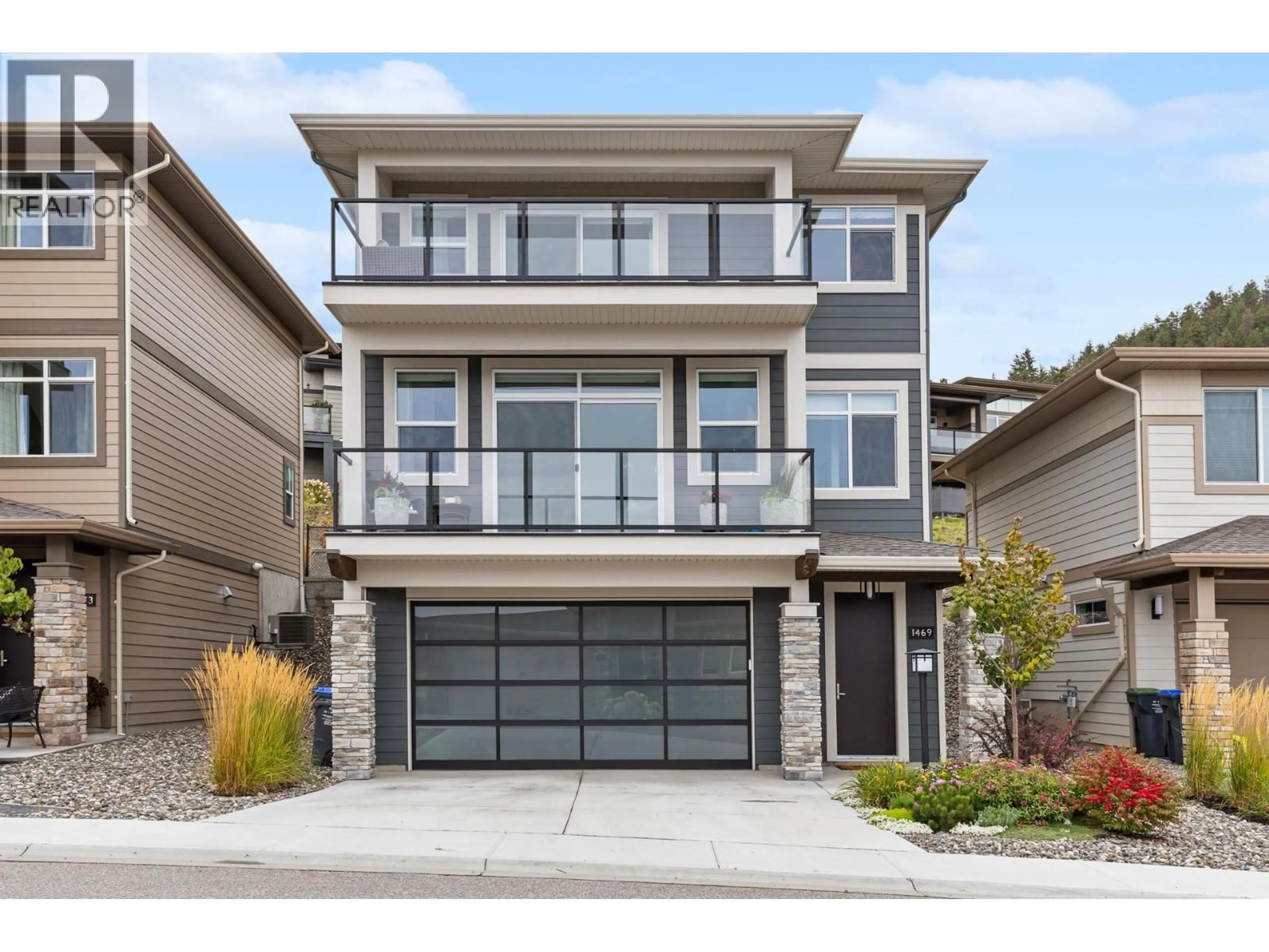 Home with brick exterior material, street for 1469 TOWER RANCH DRIVE, Kelowna British Columbia V1P1T8