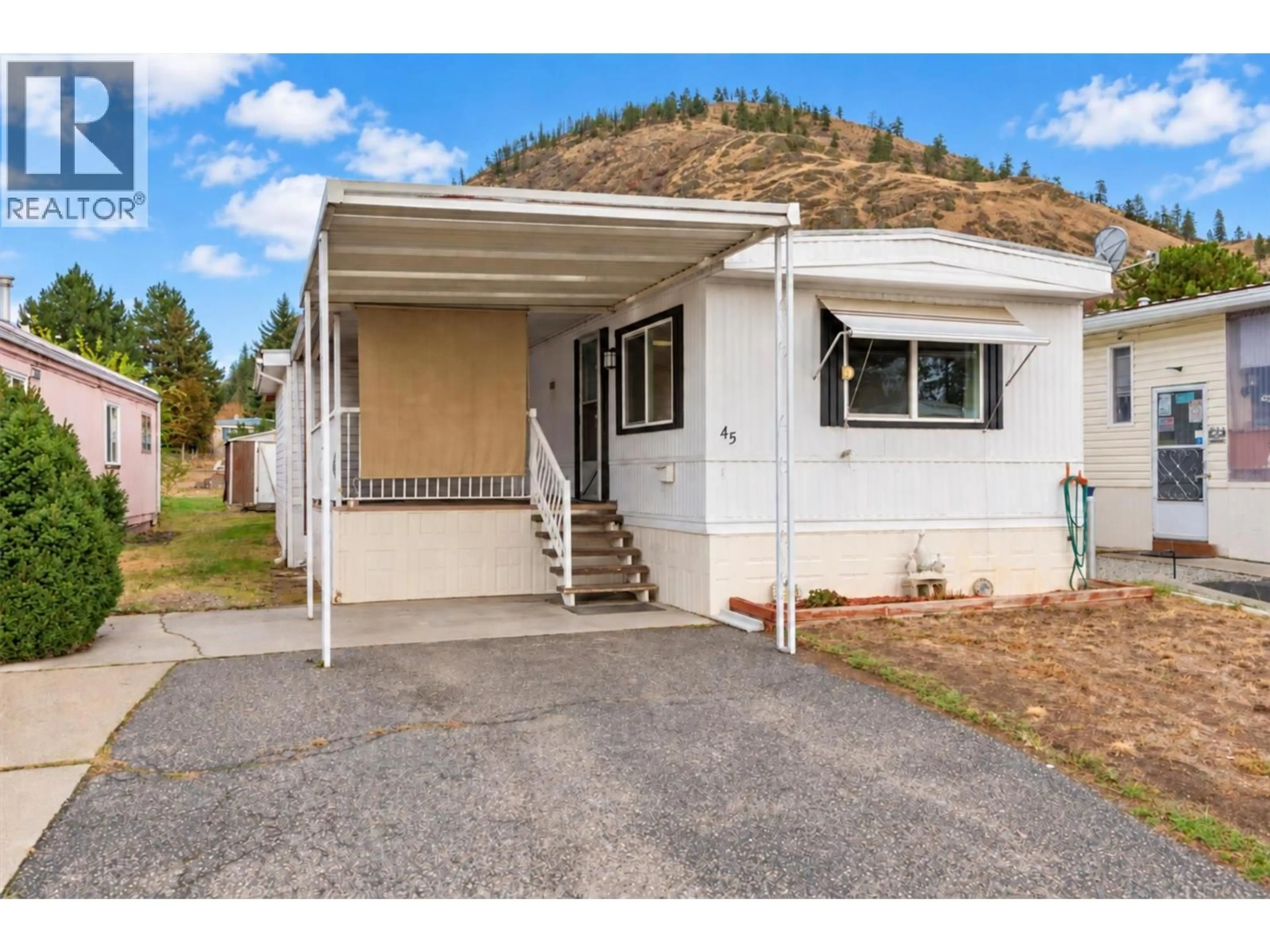 Home with vinyl exterior material, street for 45 - 1929 97 HIGHWAY SOUTH, West Kelowna British Columbia V1Z2Z1