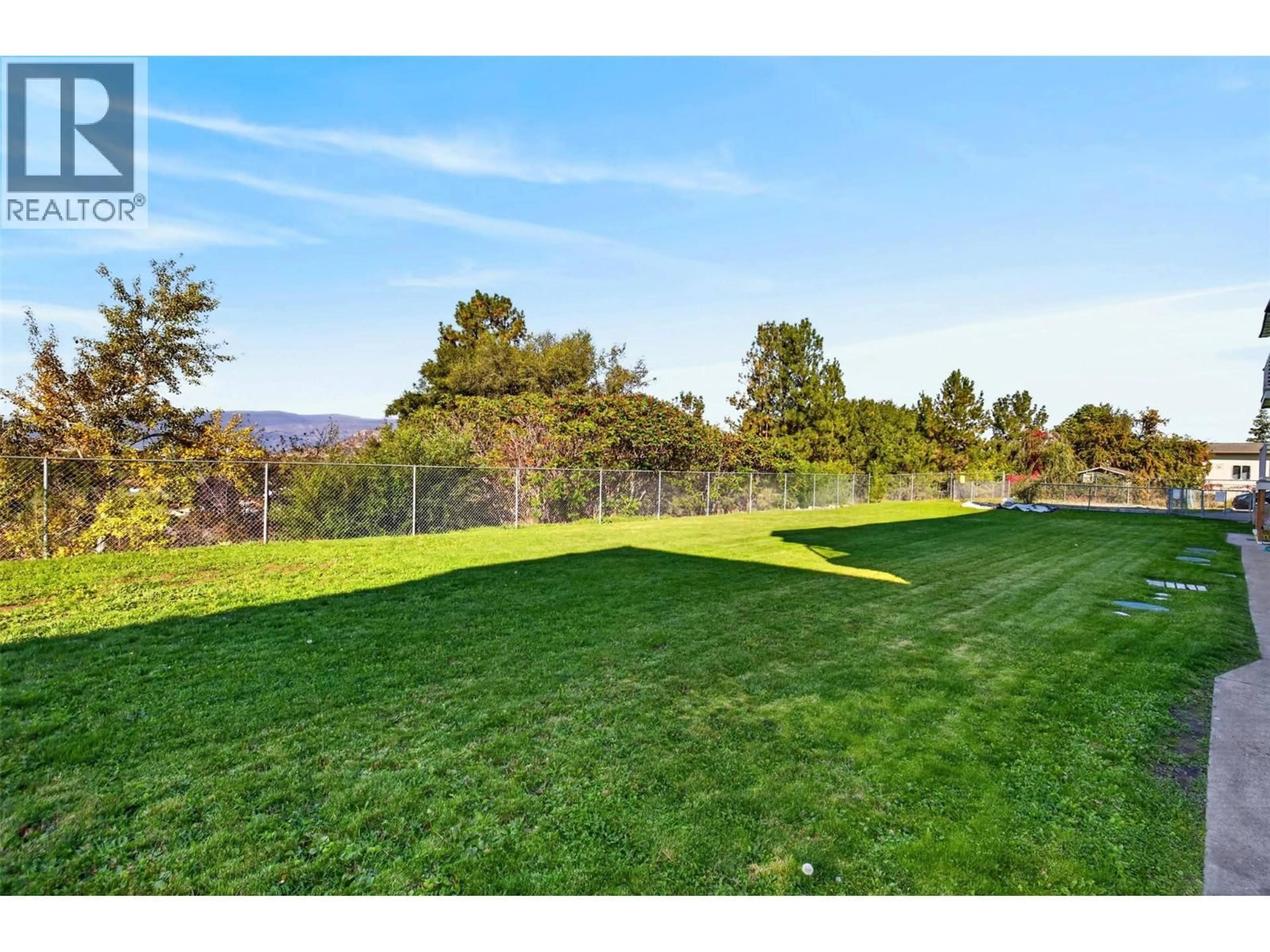 A pic from outside/outdoor area/front of a property/back of a property/a pic from drone, unknown for 14 - 445 HOLBROOK ROAD WEST, Kelowna British Columbia V1X1S4