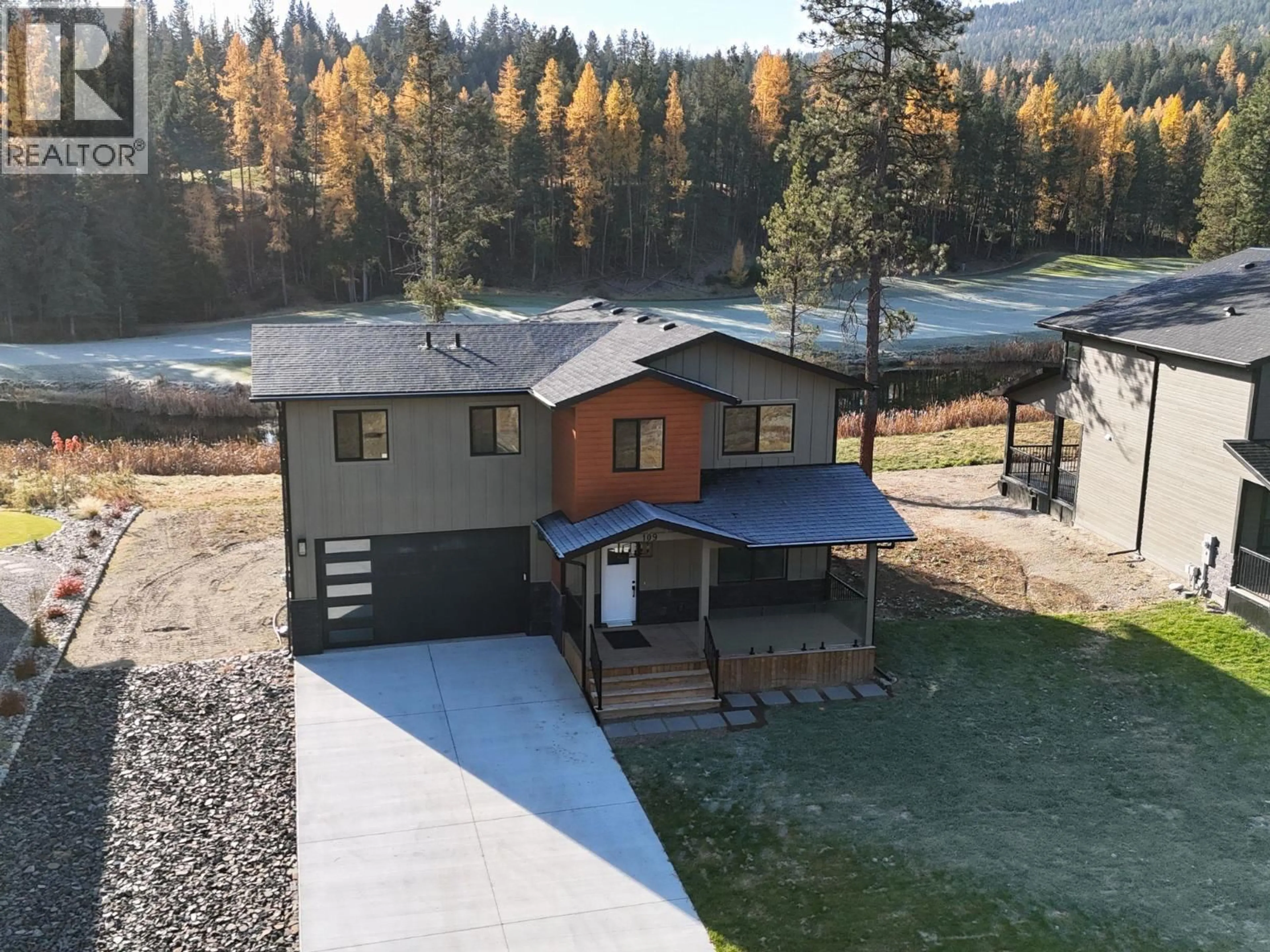 A pic from outside/outdoor area/front of a property/back of a property/a pic from drone, mountain view for 109 RIVER DRIVE, Cranbrook British Columbia V1C0C6