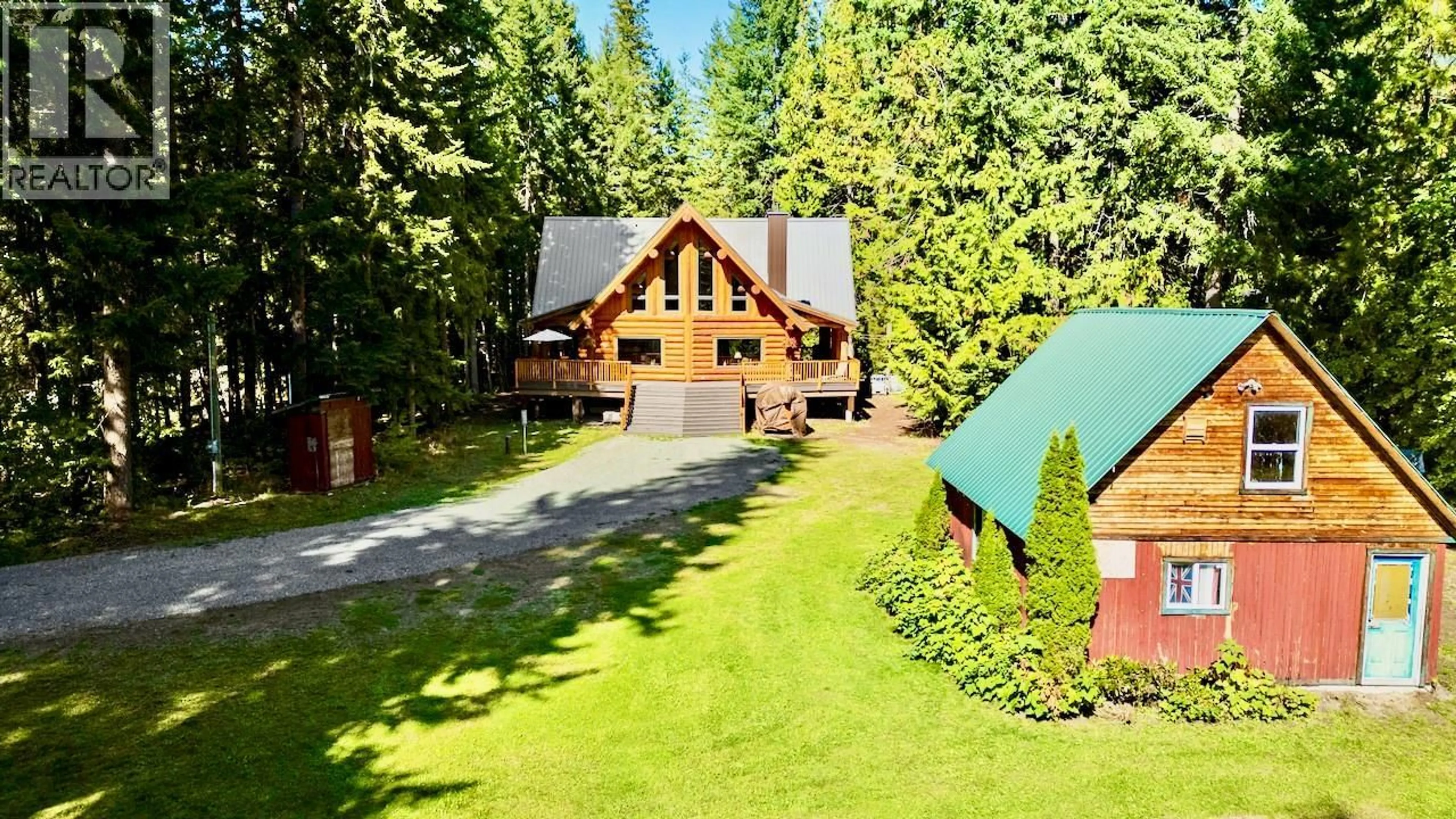 A pic from outside/outdoor area/front of a property/back of a property/a pic from drone, forest/trees view for 2380 WM BROWN ROAD, Magna Bay British Columbia V0E1M7