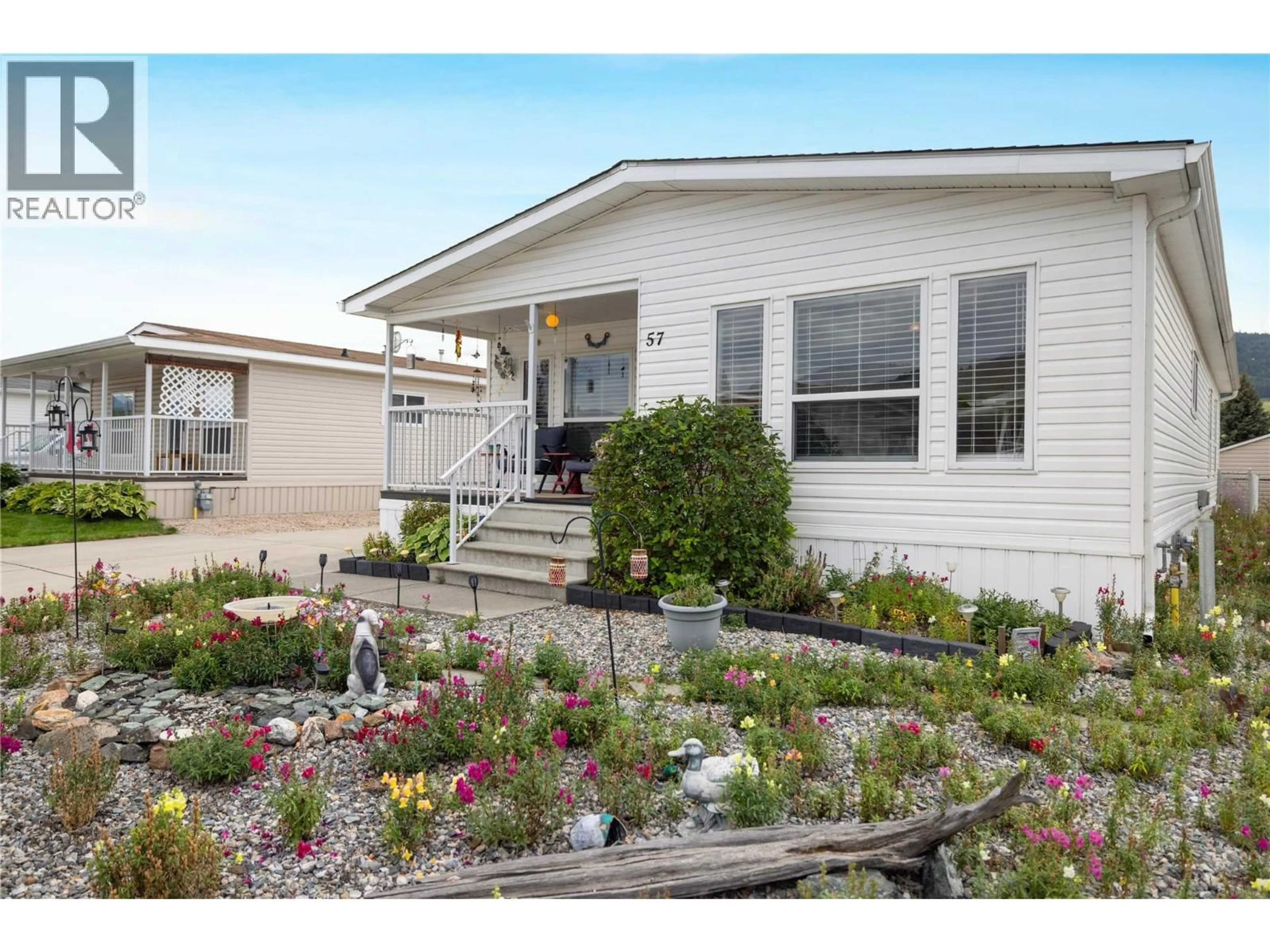 Home with vinyl exterior material, unknown for 57 - 6688 TRONSON ROAD, Vernon British Columbia V1H1R9