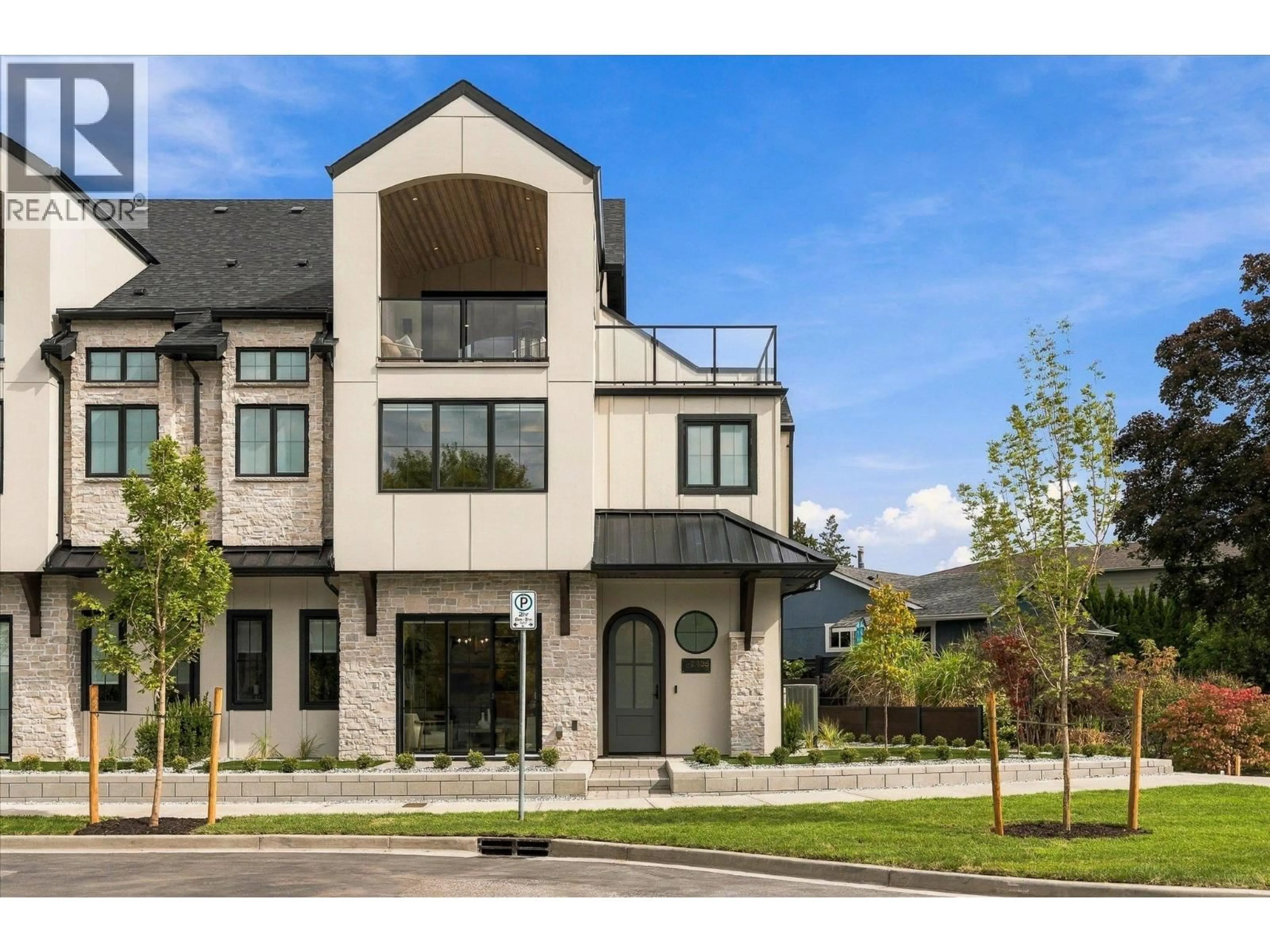 Home with brick exterior material, street for 1 - 2435 TAYLOR CRESCENT, Kelowna British Columbia V1Y1L9