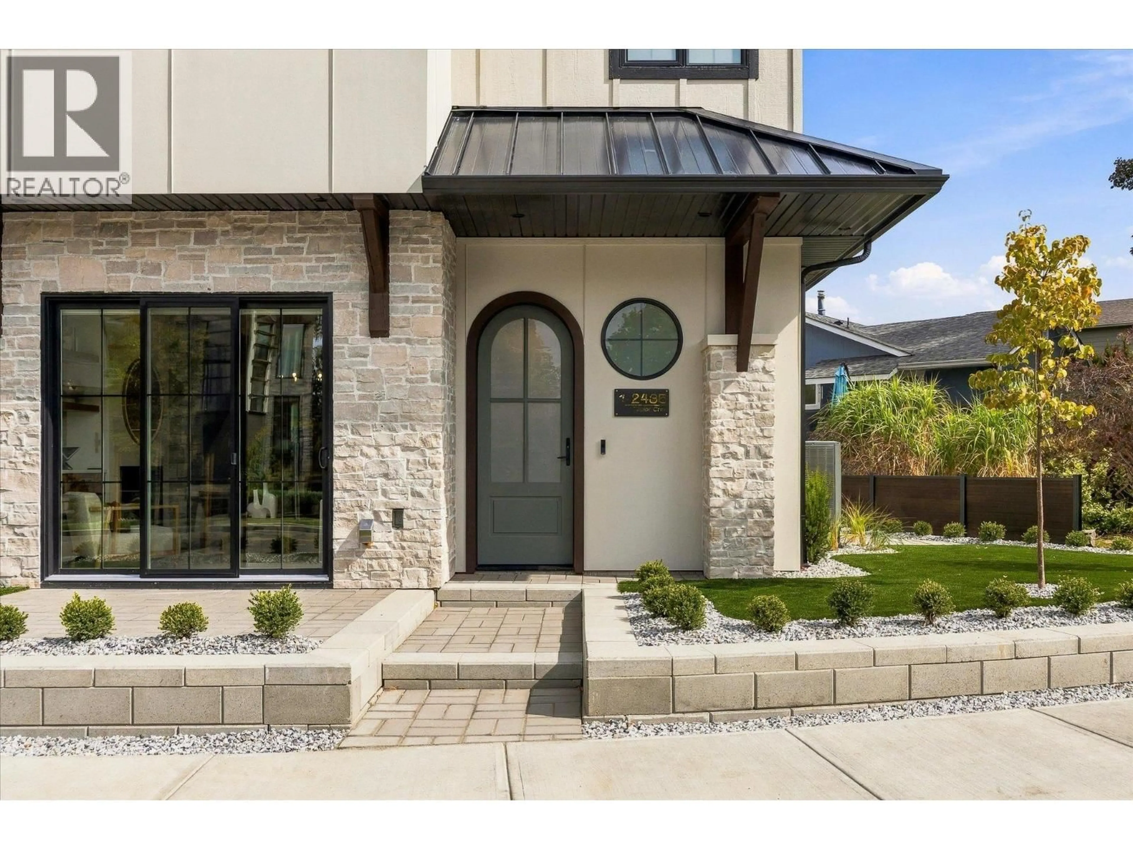 Home with brick exterior material, street for 1 - 2435 TAYLOR CRESCENT, Kelowna British Columbia V1Y1L9