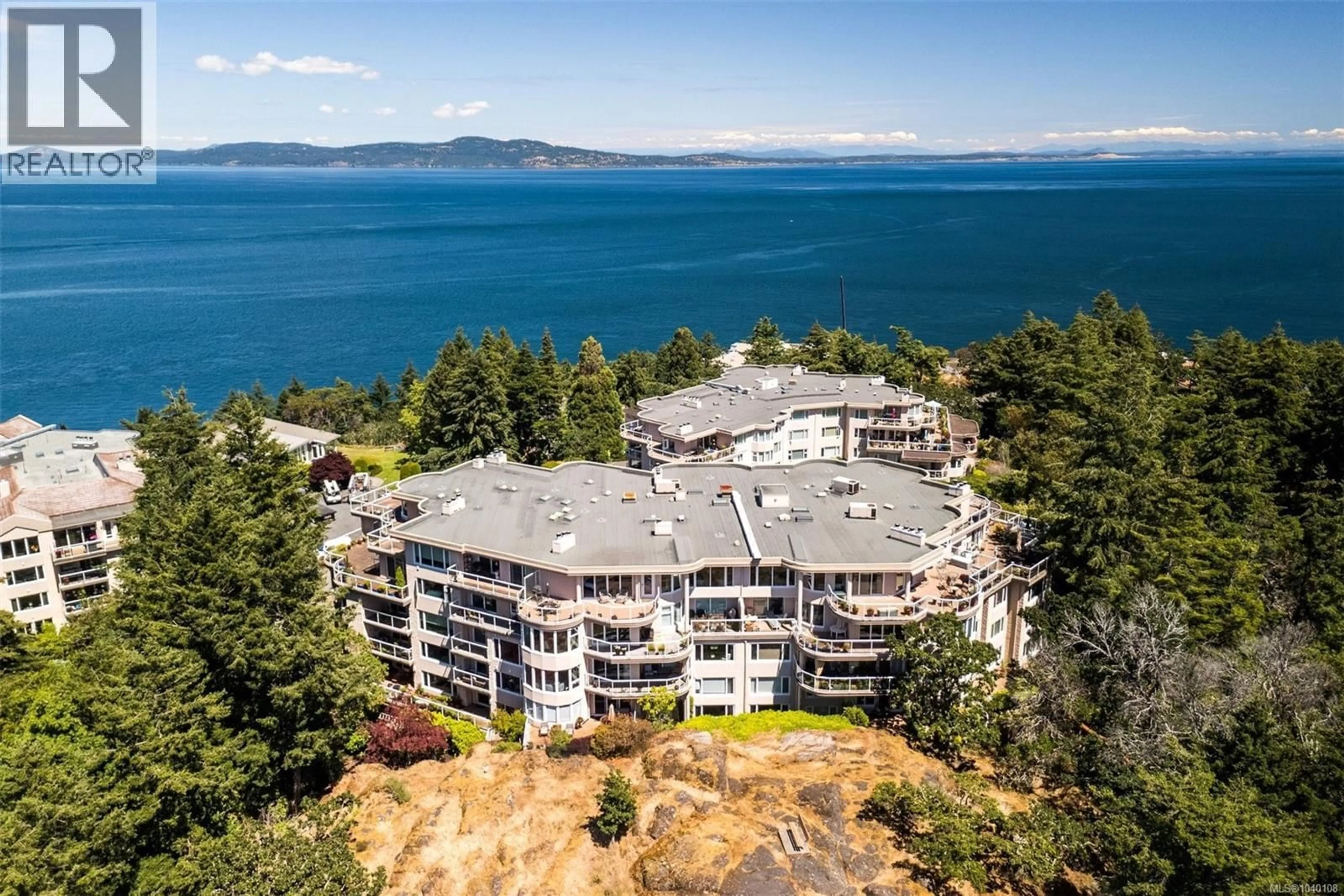 A pic from outside/outdoor area/front of a property/back of a property/a pic from drone, water/lake/river/ocean view for PH52 - 2829 ARBUTUS ROAD, Saanich British Columbia V8N5X5