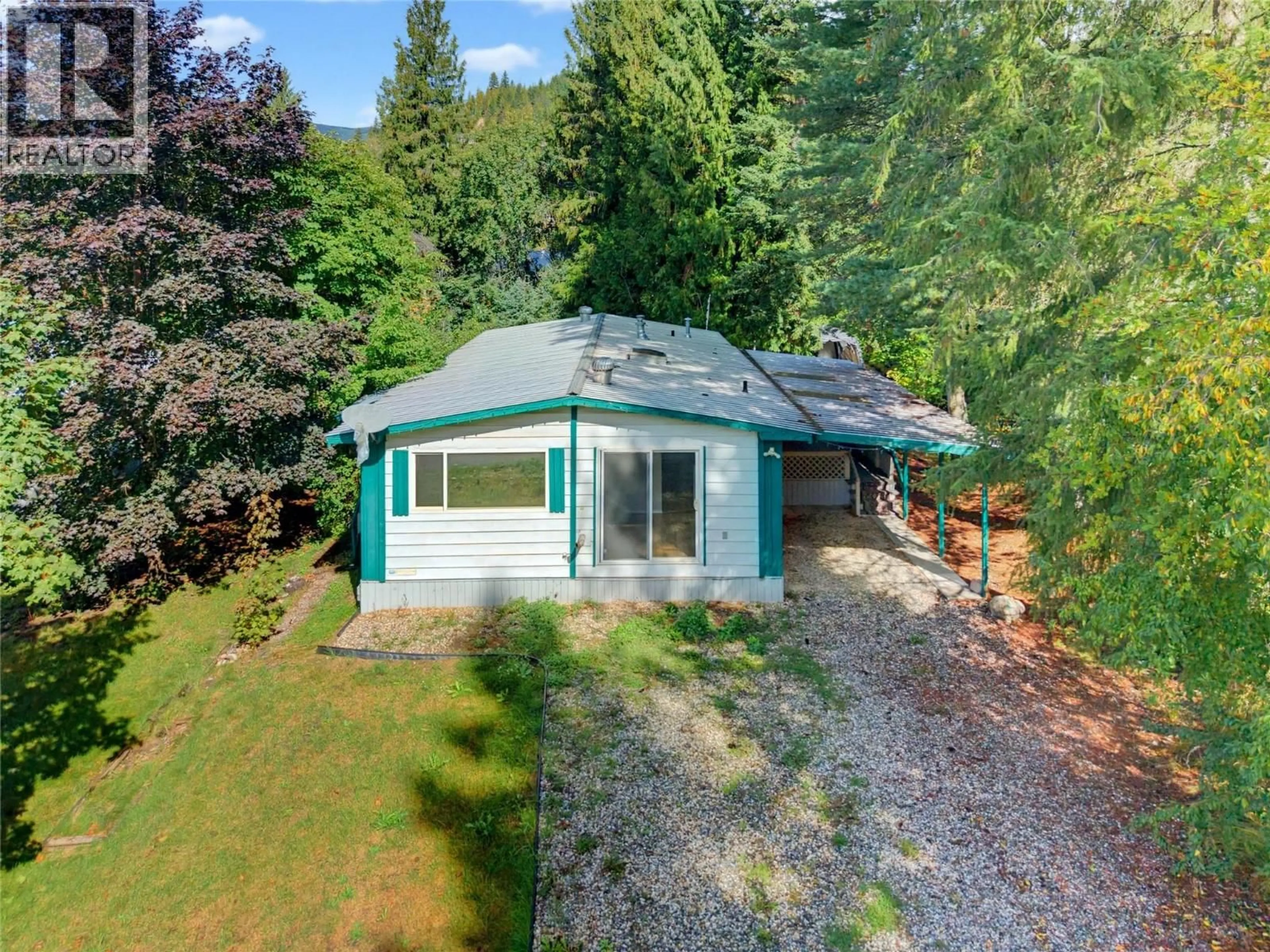 A pic from outside/outdoor area/front of a property/back of a property/a pic from drone, water/lake/river/ocean view for 8 - 5 97A HIGHWAY, Sicamous British Columbia V0E2V1