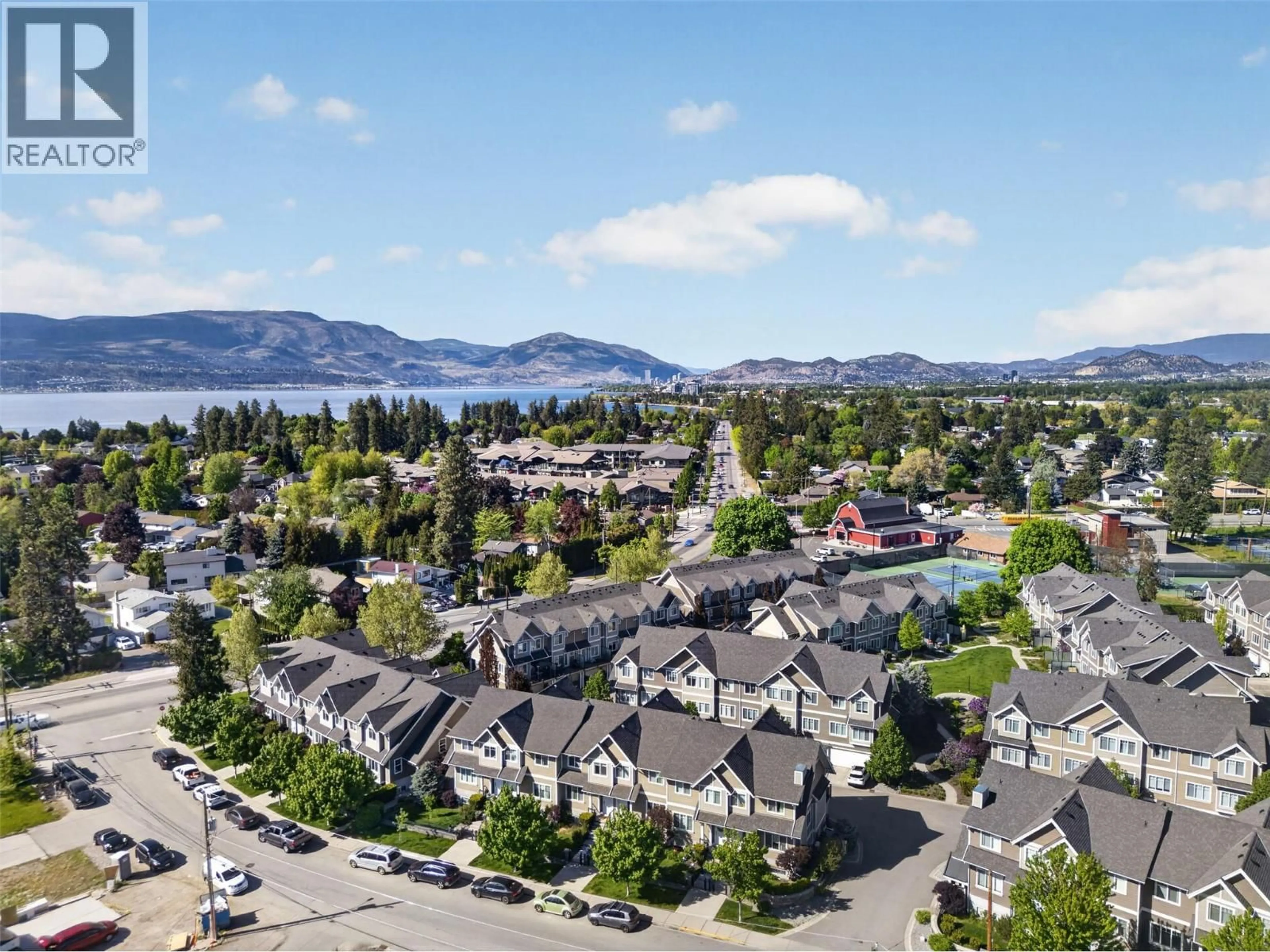 A pic from outside/outdoor area/front of a property/back of a property/a pic from drone, mountain view for 4 - 600 SHERWOOD ROAD, Kelowna British Columbia V1W5K1