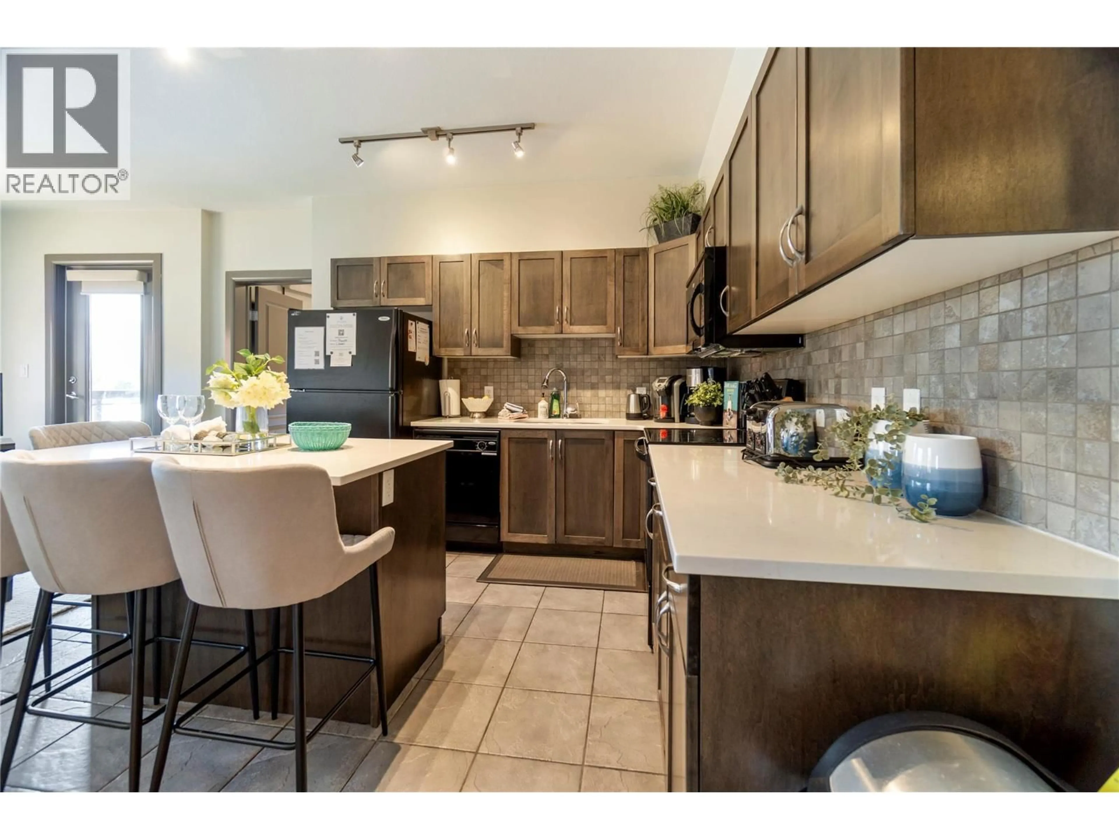 Open concept kitchen, ceramic/tile floor for 501 - 654 COOK ROAD, Kelowna British Columbia V1W3G7