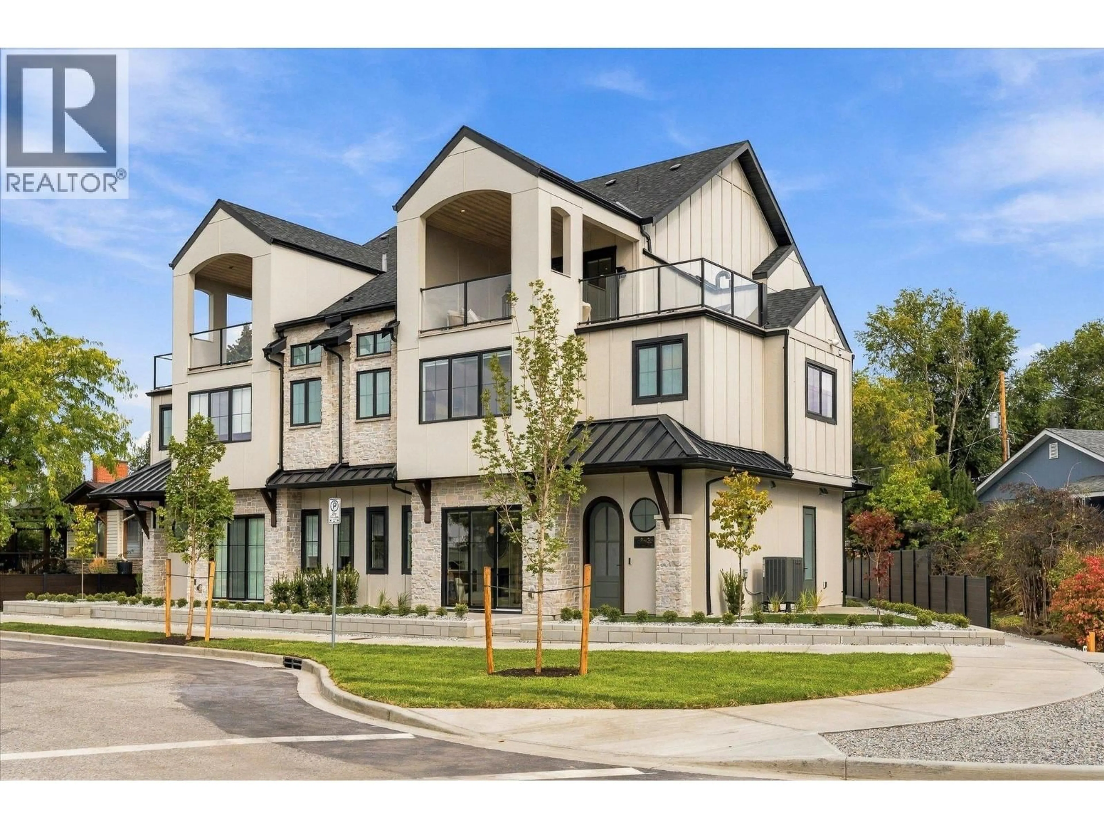 Home with vinyl exterior material, street for 2 - 2435 TAYLOR CRESCENT, Kelowna British Columbia V1Y4L9