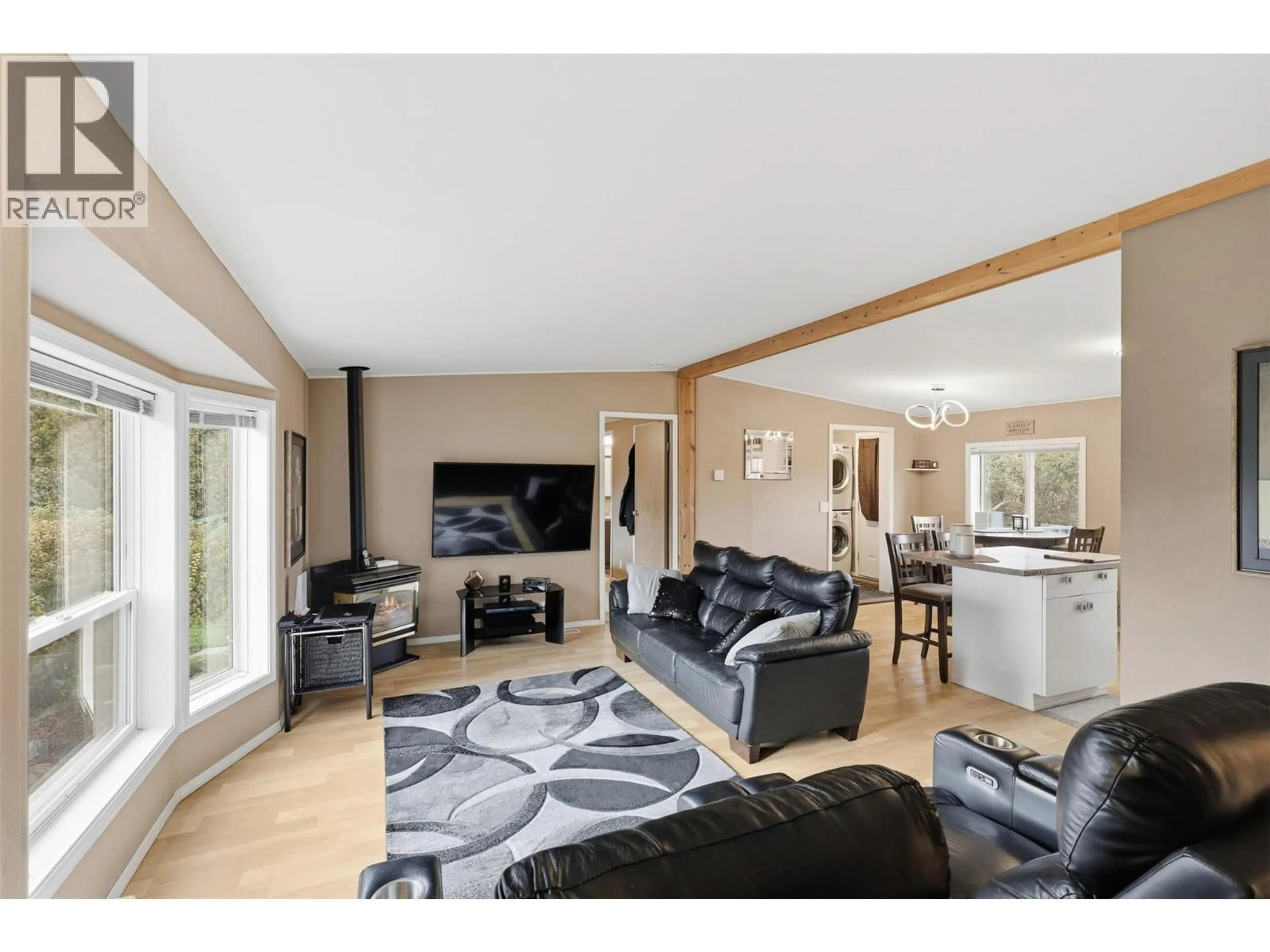 Living room with furniture, wood/laminate floor for 120 ZIRNHELT ROAD, Kamloops British Columbia V2H0B3