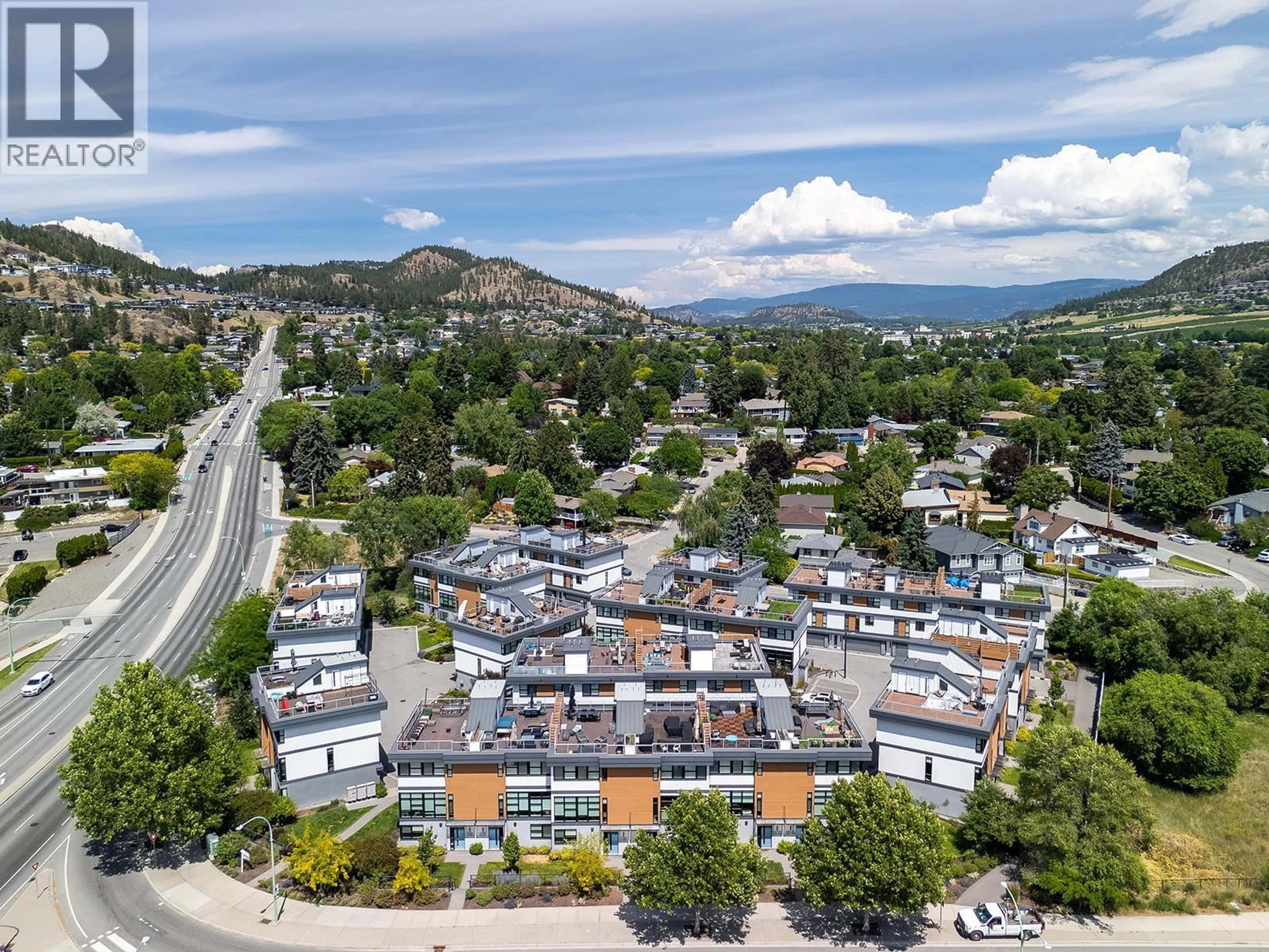 A pic from outside/outdoor area/front of a property/back of a property/a pic from drone, mountain view for 20 - 1515 HIGHLAND DRIVE NORTH, Kelowna British Columbia V1Y0C9