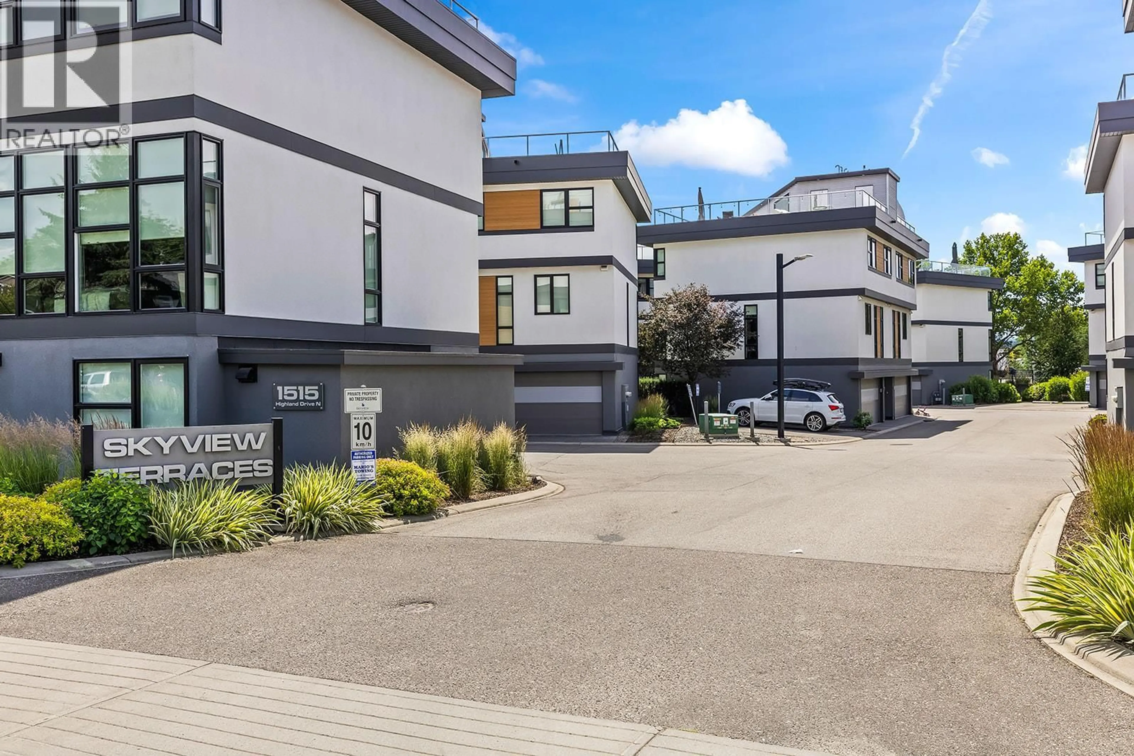 A pic from outside/outdoor area/front of a property/back of a property/a pic from drone, street for 20 - 1515 HIGHLAND DRIVE NORTH, Kelowna British Columbia V1Y0C9