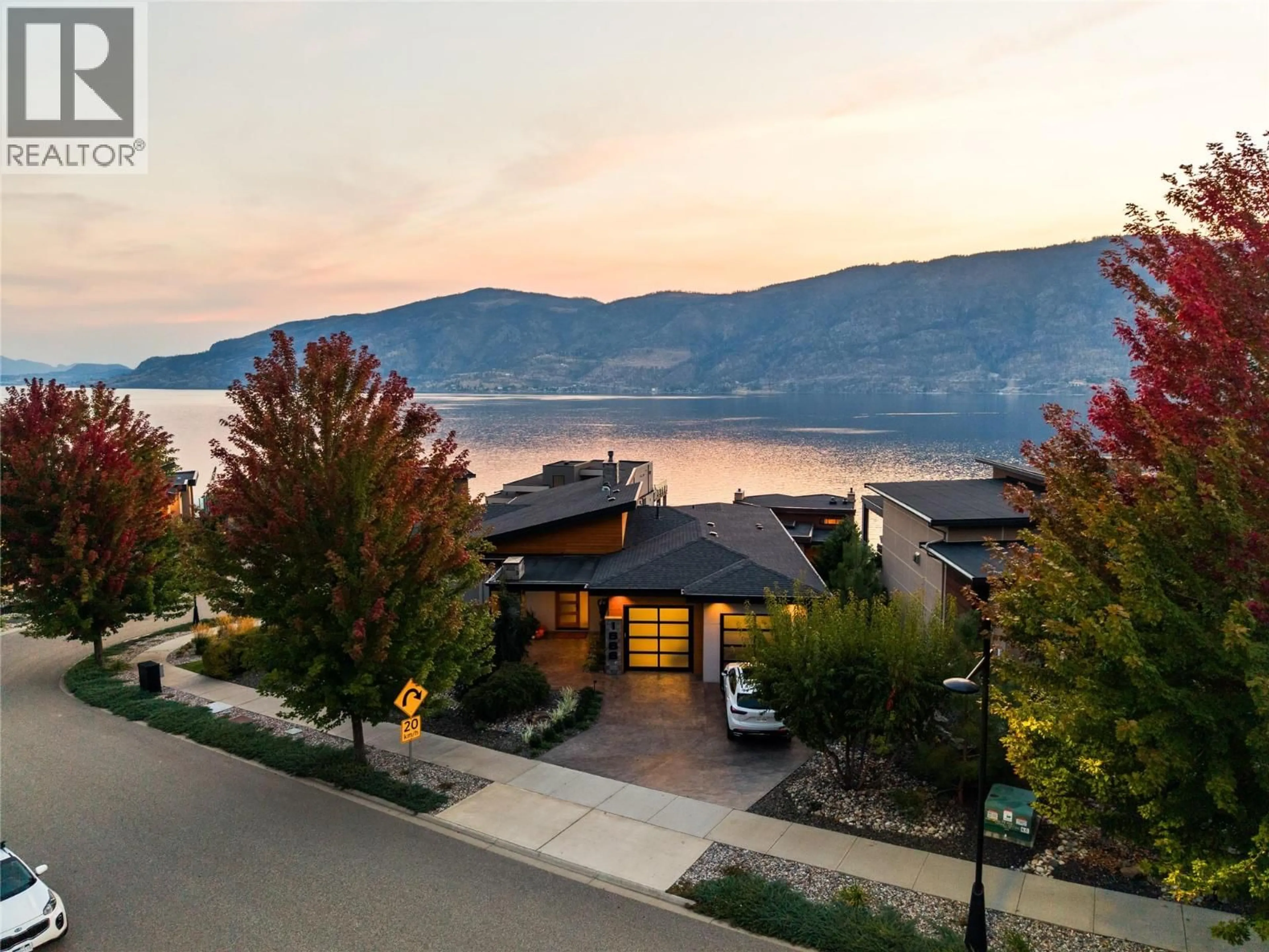 A pic from outside/outdoor area/front of a property/back of a property/a pic from drone, mountain view for 1666 LAKESTONE DRIVE, Lake Country British Columbia V4V2T4