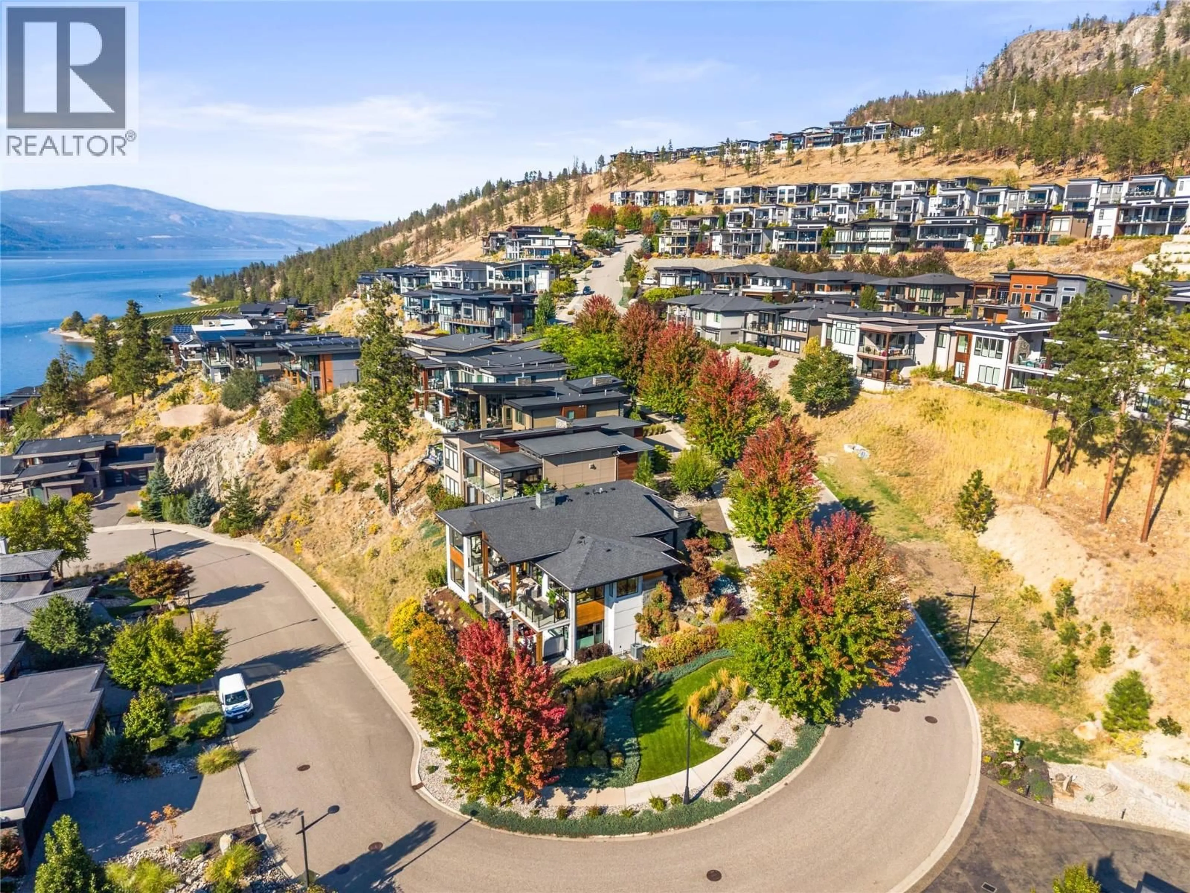 A pic from outside/outdoor area/front of a property/back of a property/a pic from drone, water/lake/river/ocean view for 1666 LAKESTONE DRIVE, Lake Country British Columbia V4V2T4