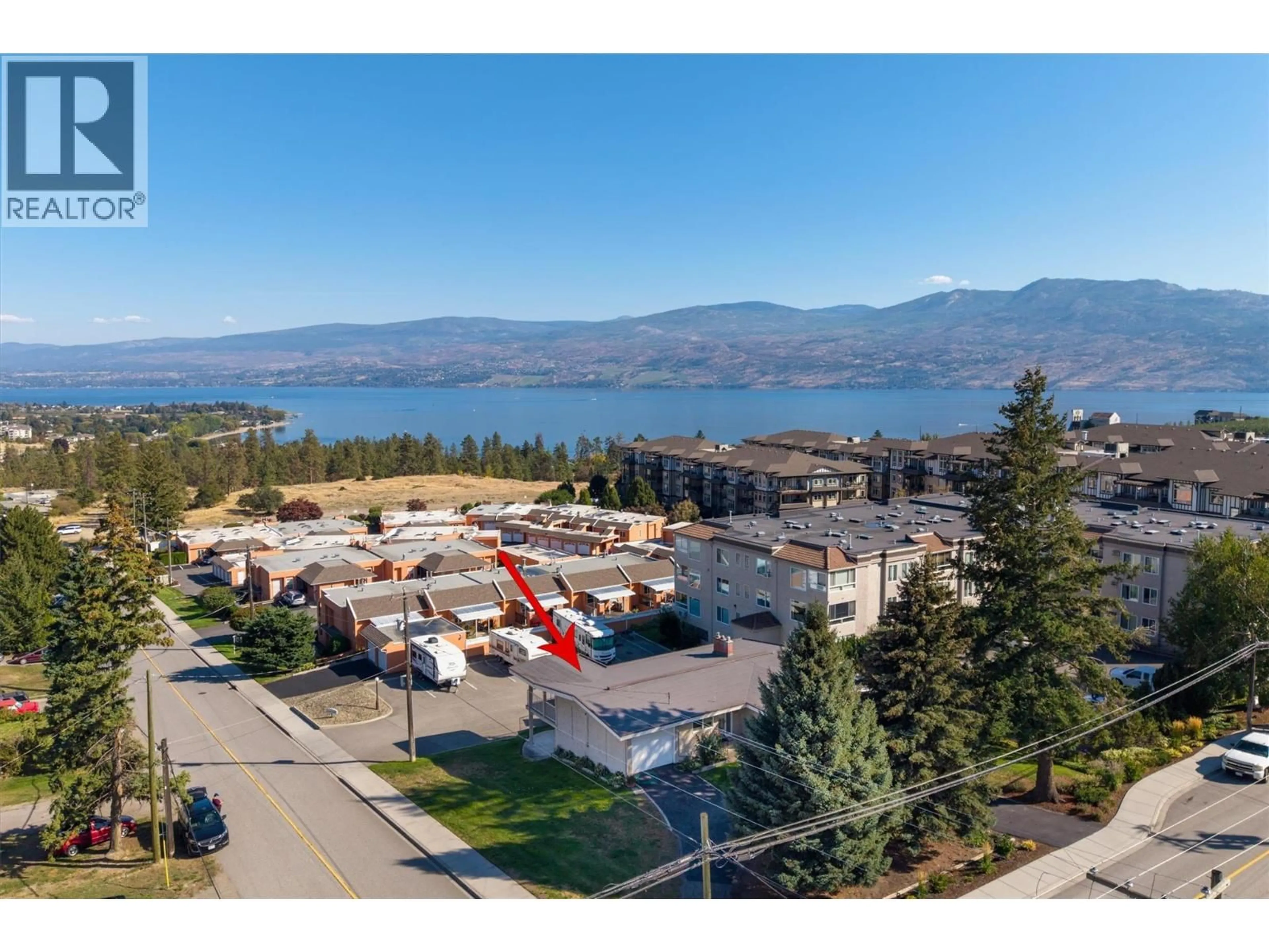 A pic from outside/outdoor area/front of a property/back of a property/a pic from drone, mountain view for 3803 BROWN ROAD, West Kelowna British Columbia V4T2J3