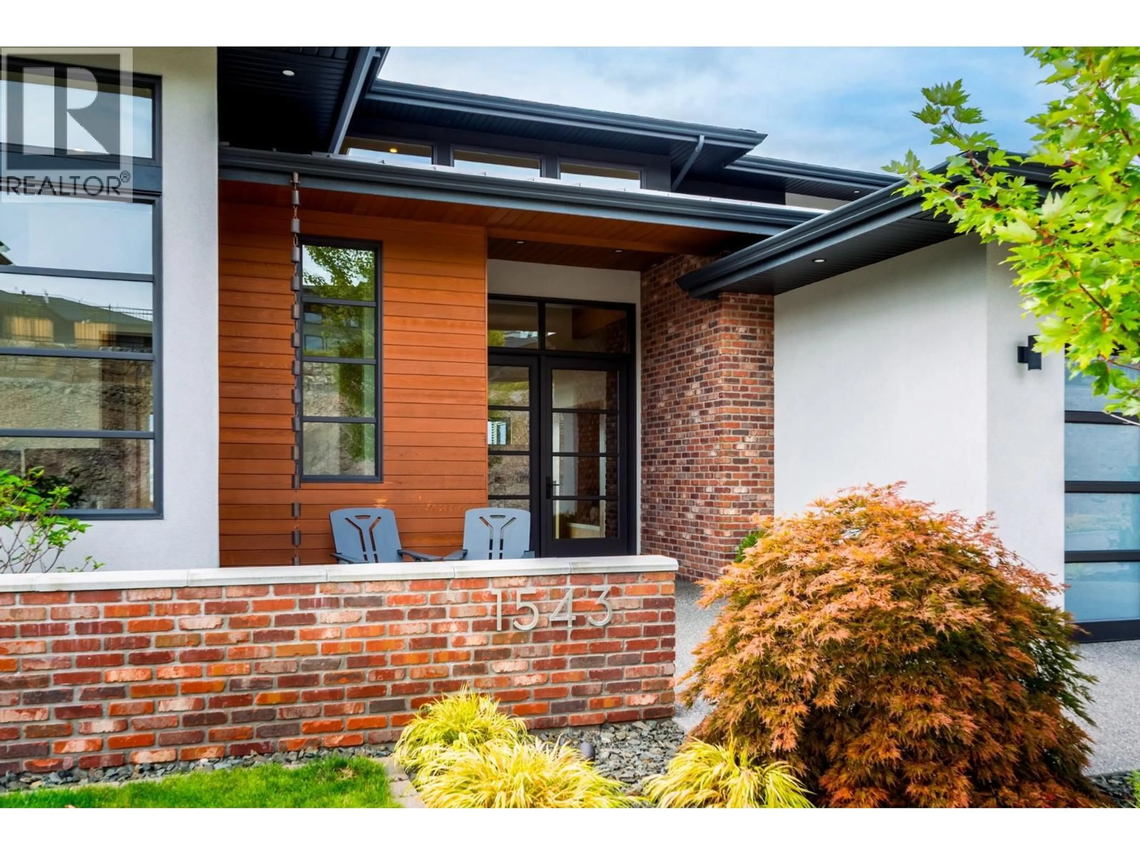 Home with brick exterior material, street for 1543 ROCKY POINT DRIVE, Kelowna British Columbia V1V3E2
