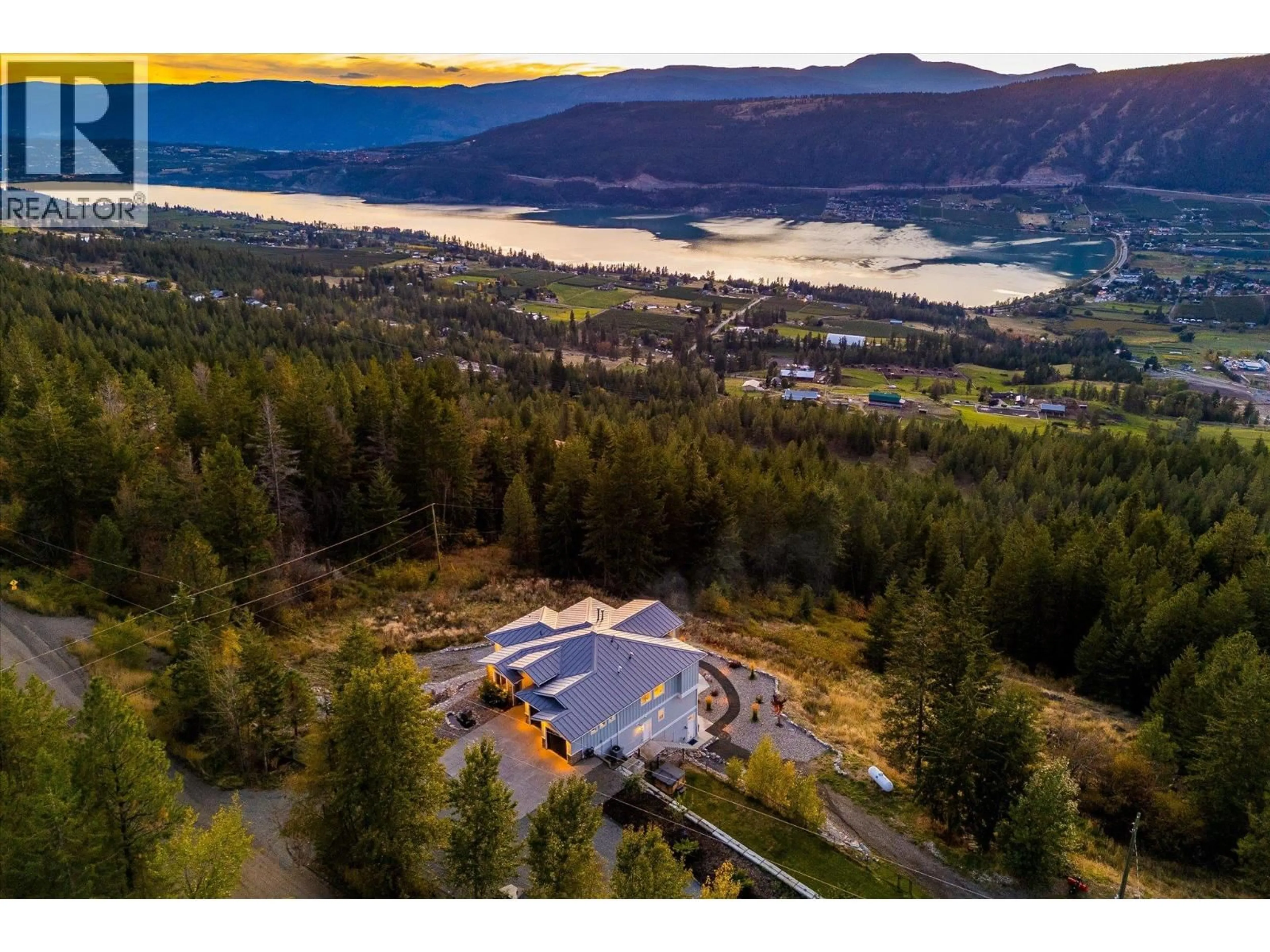 A pic from outside/outdoor area/front of a property/back of a property/a pic from drone, mountain view for 6022 OYAMA LAKE ROAD, Lake Country British Columbia V4V2C9