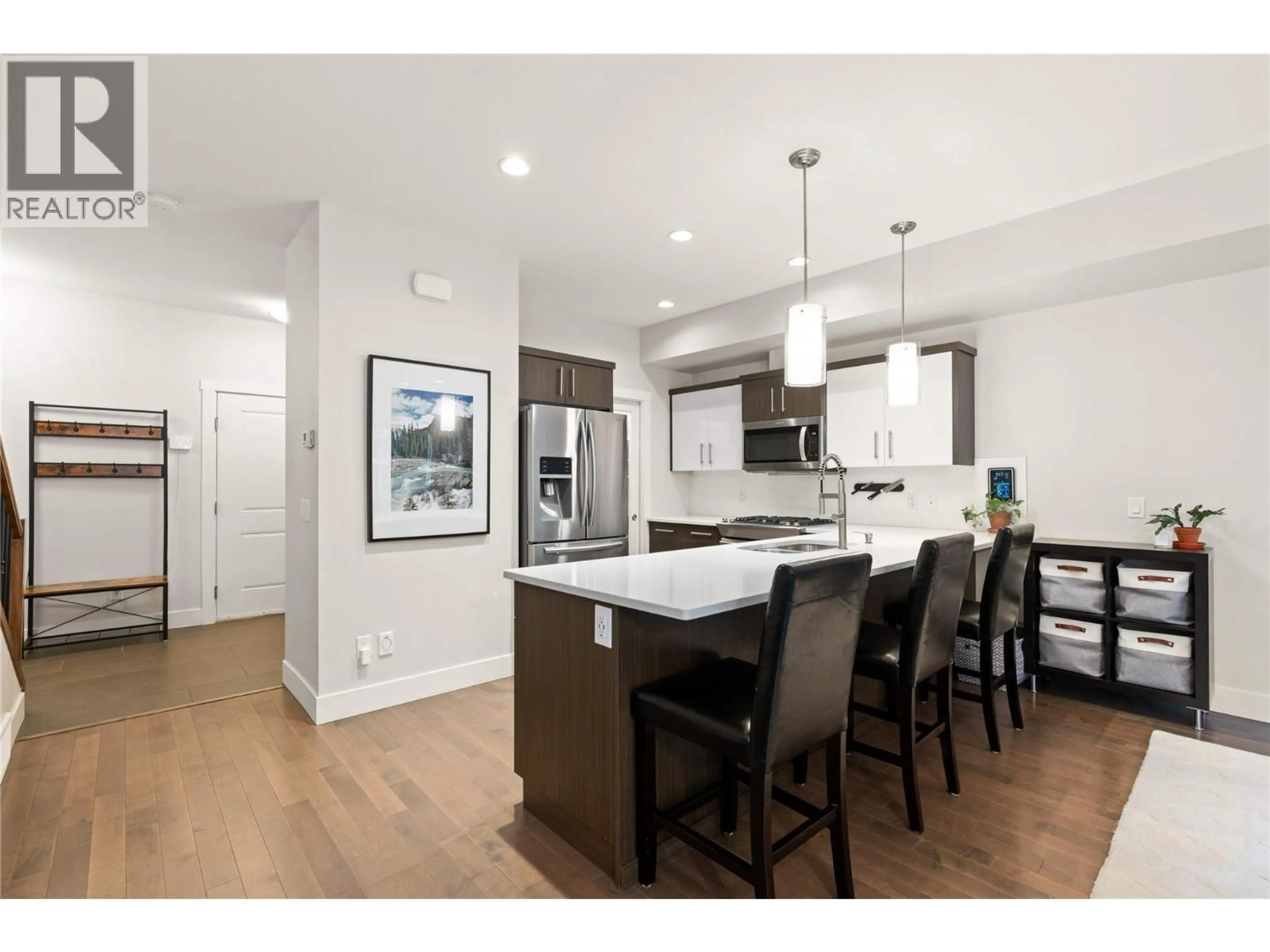 Open concept kitchen, wood/laminate floor for 58 - 600 BOYNTON PLACE, Kelowna British Columbia V1V3B8