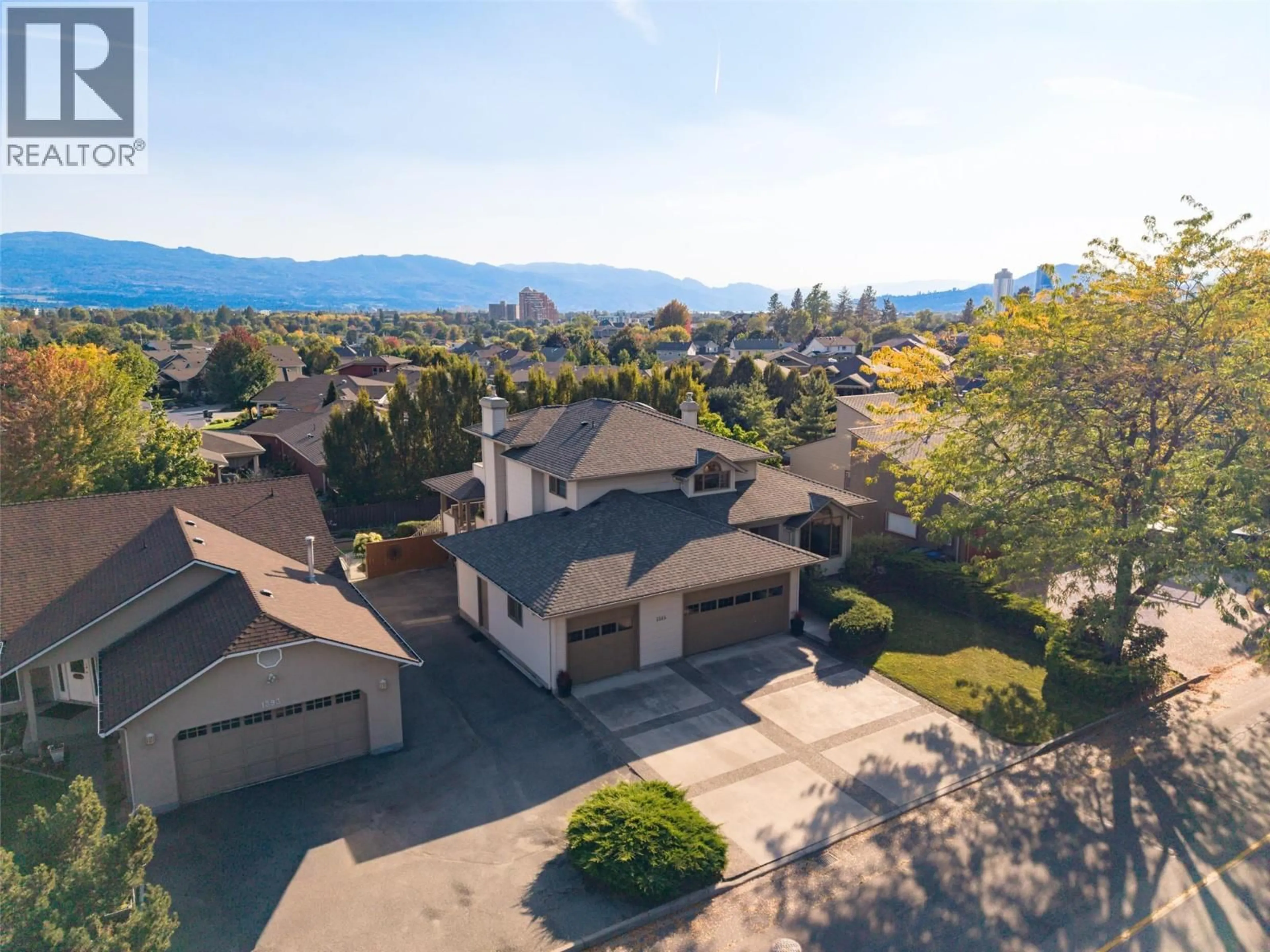 A pic from outside/outdoor area/front of a property/back of a property/a pic from drone, mountain view for 1385 MOUNTAIN AVENUE, Kelowna British Columbia V1Y7H3