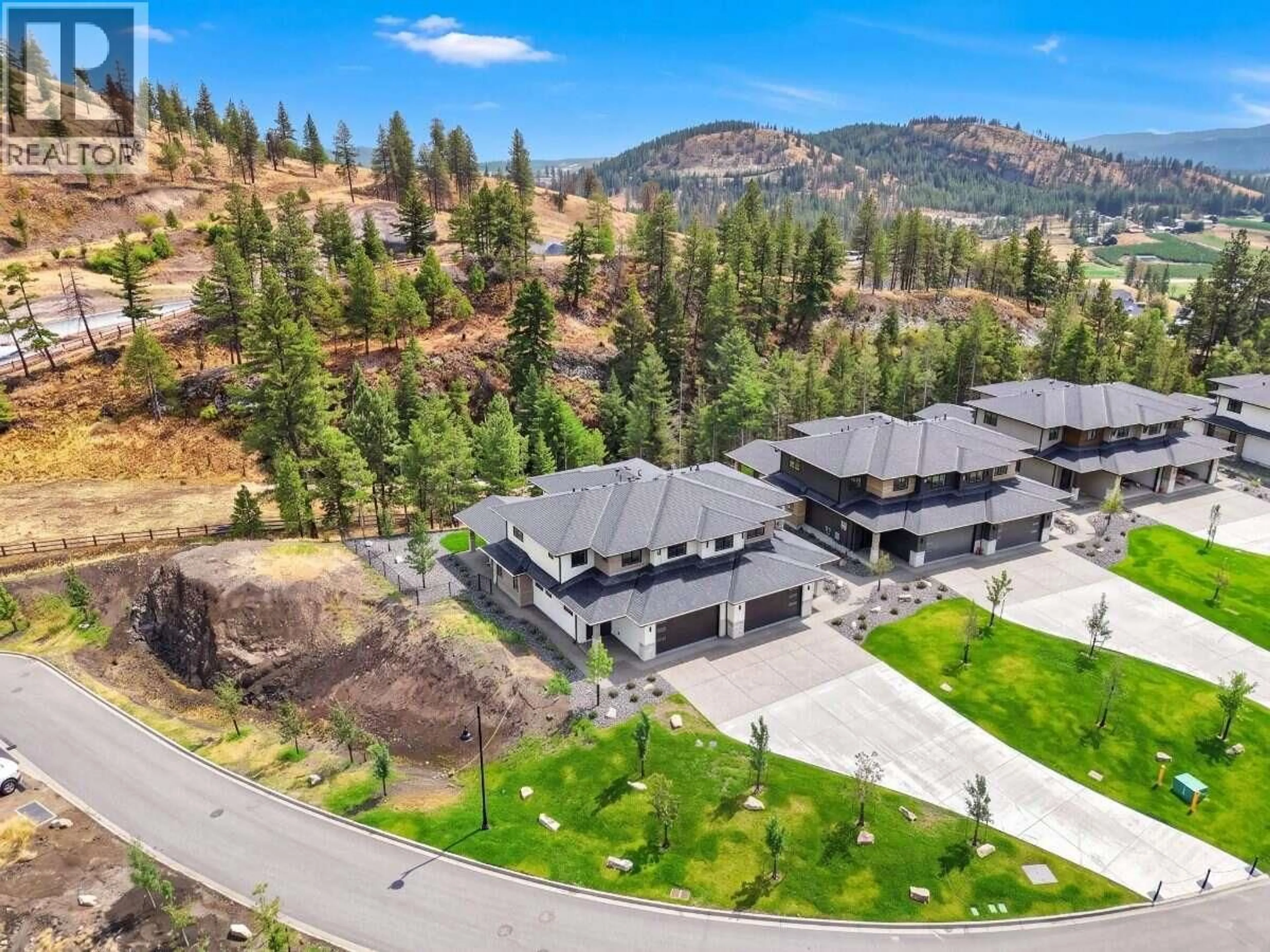 A pic from outside/outdoor area/front of a property/back of a property/a pic from drone, mountain view for 30 - 1720 HIDDEN HILLS DRIVE, Kelowna British Columbia V1V0J5