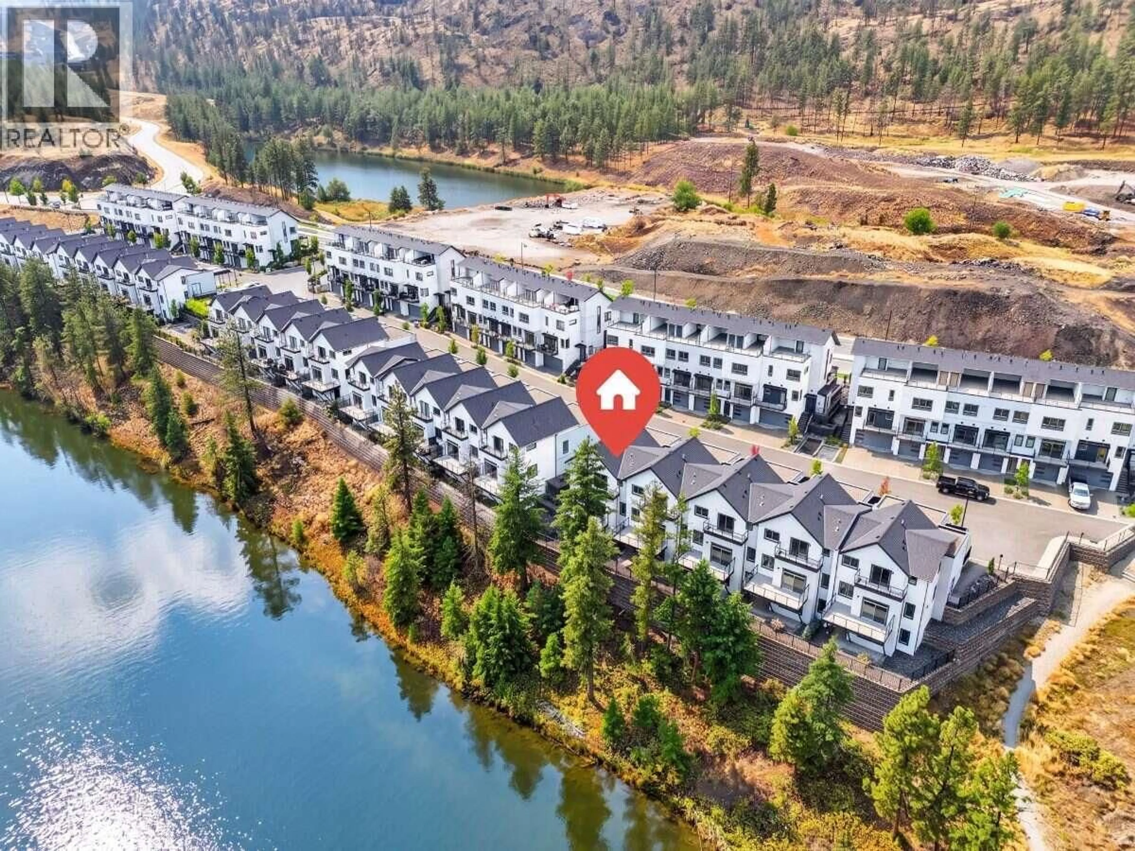 A pic from outside/outdoor area/front of a property/back of a property/a pic from drone, water/lake/river/ocean view for 57 - 1550 UNION ROAD, Kelowna British Columbia V1V0G9