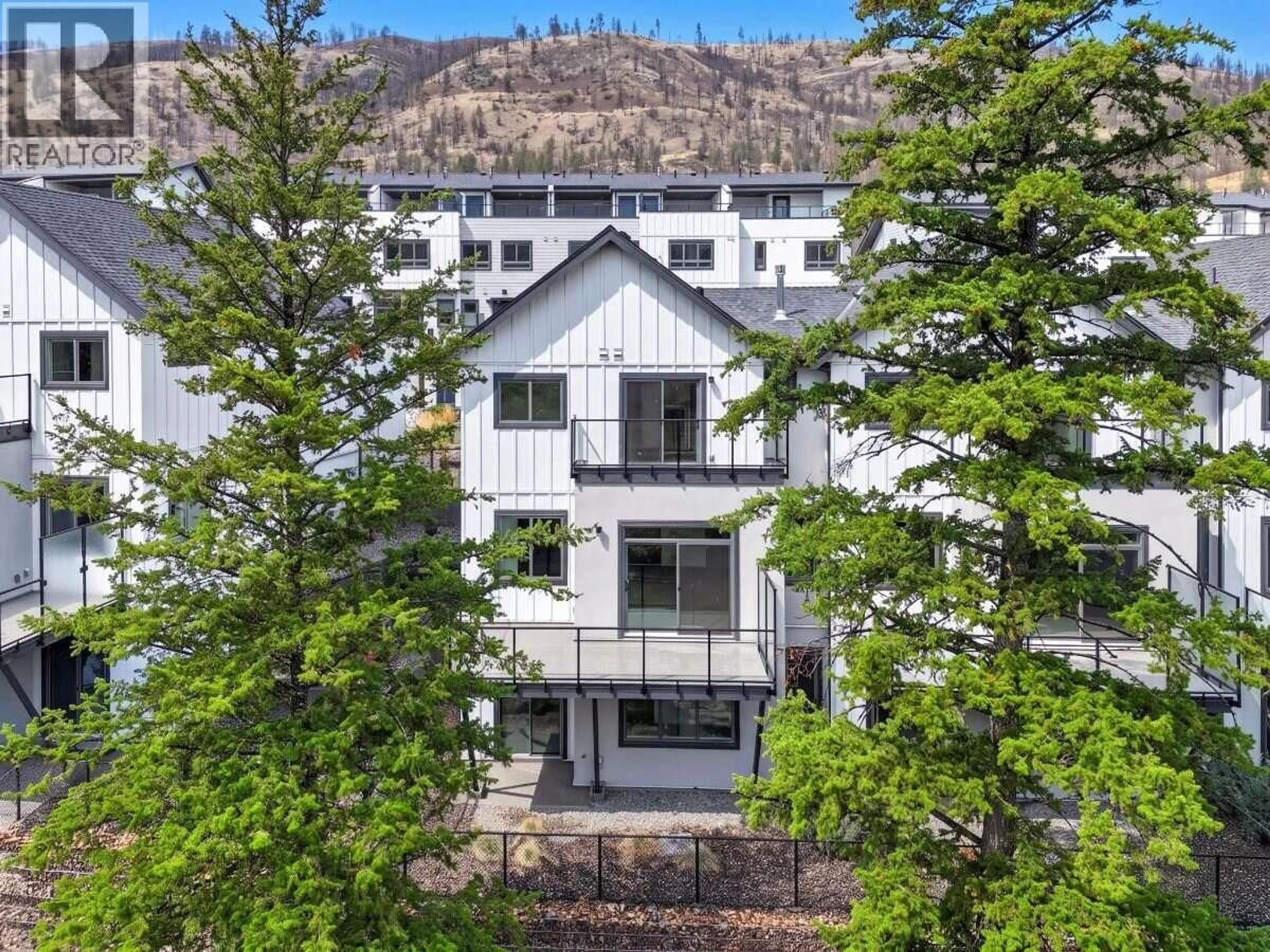 A pic from outside/outdoor area/front of a property/back of a property/a pic from drone, mountain view for 57 - 1550 UNION ROAD, Kelowna British Columbia V1V0G9