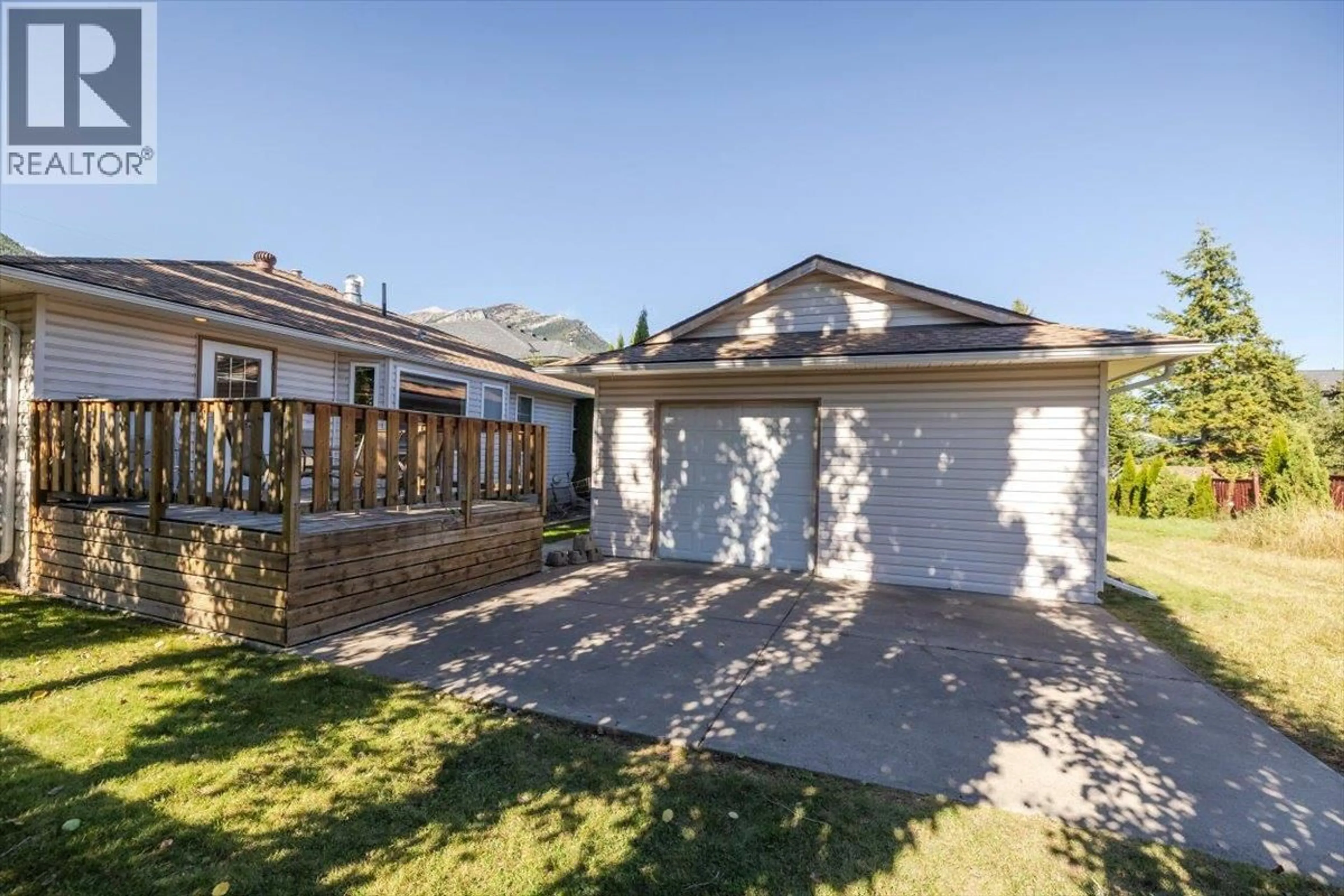 A pic from outside/outdoor area/front of a property/back of a property/a pic from drone, street for 1122 11TH AVENUE, Fernie British Columbia V0B1M1