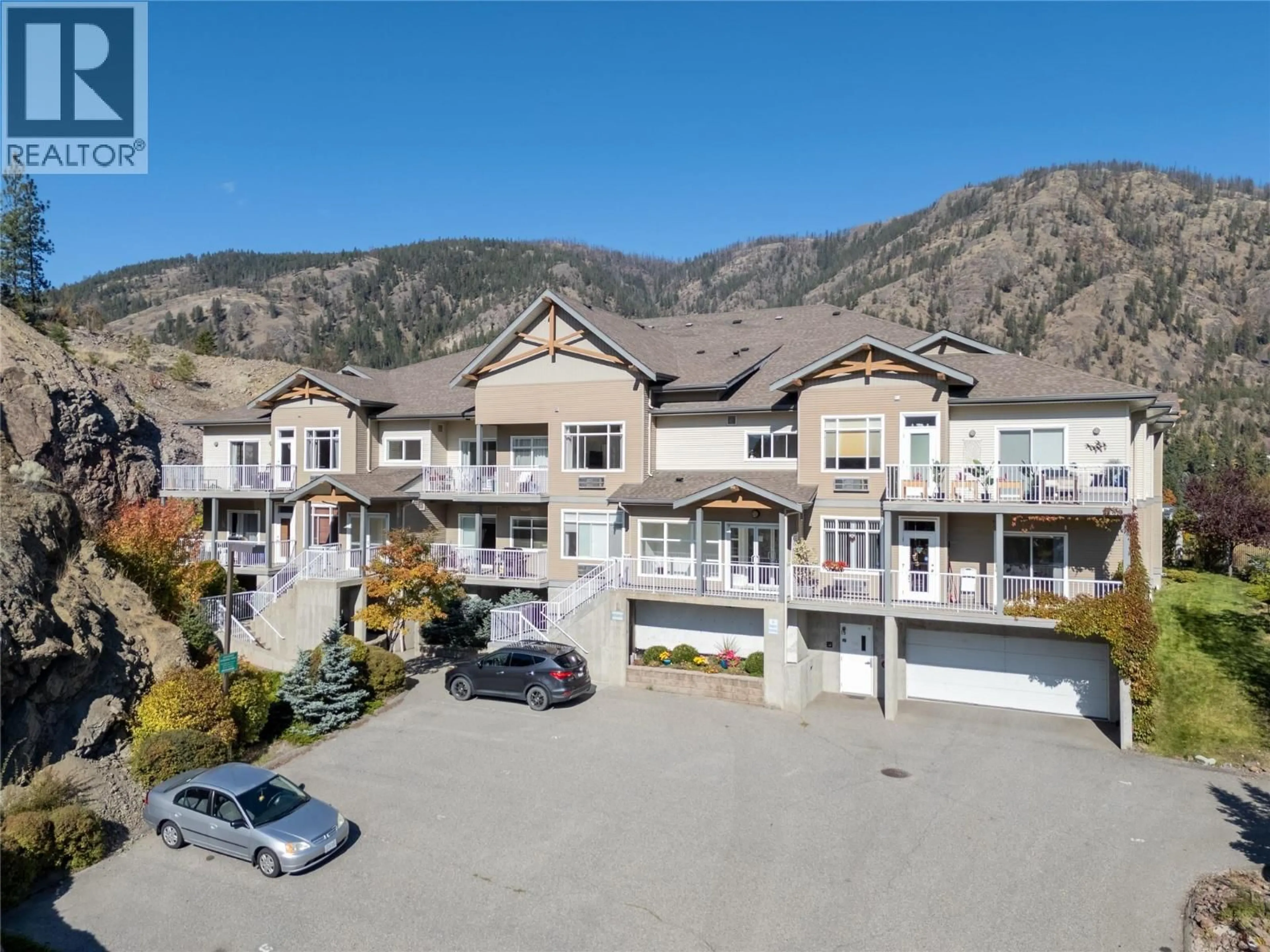 A pic from outside/outdoor area/front of a property/back of a property/a pic from drone, mountain view for 203 - 2523 SHANNON VIEW DRIVE, West Kelowna British Columbia V4T2Z7