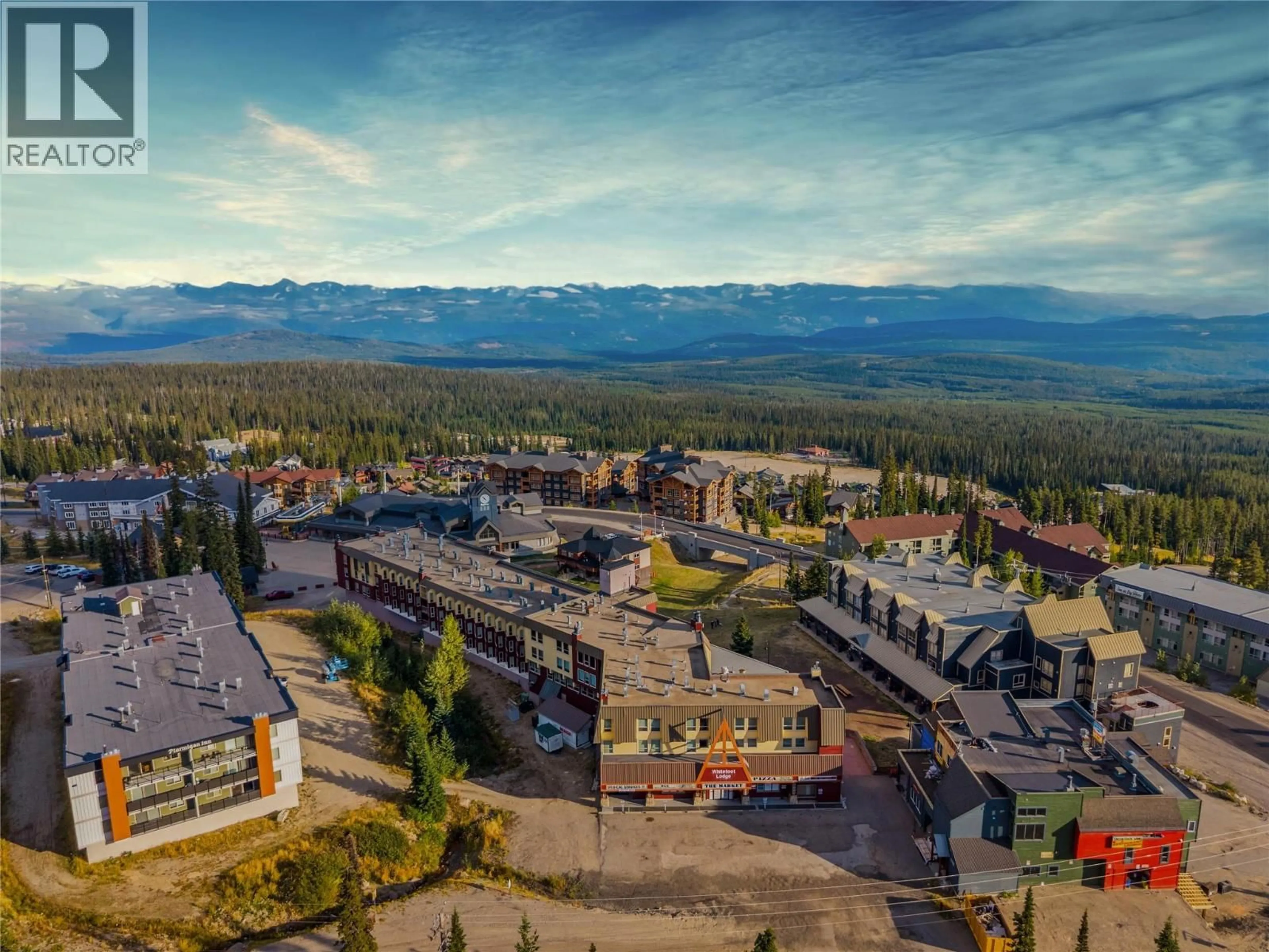 A pic from outside/outdoor area/front of a property/back of a property/a pic from drone, mountain view for 204 - 5375 BIG WHITE ROAD, Big White British Columbia V1P1T4