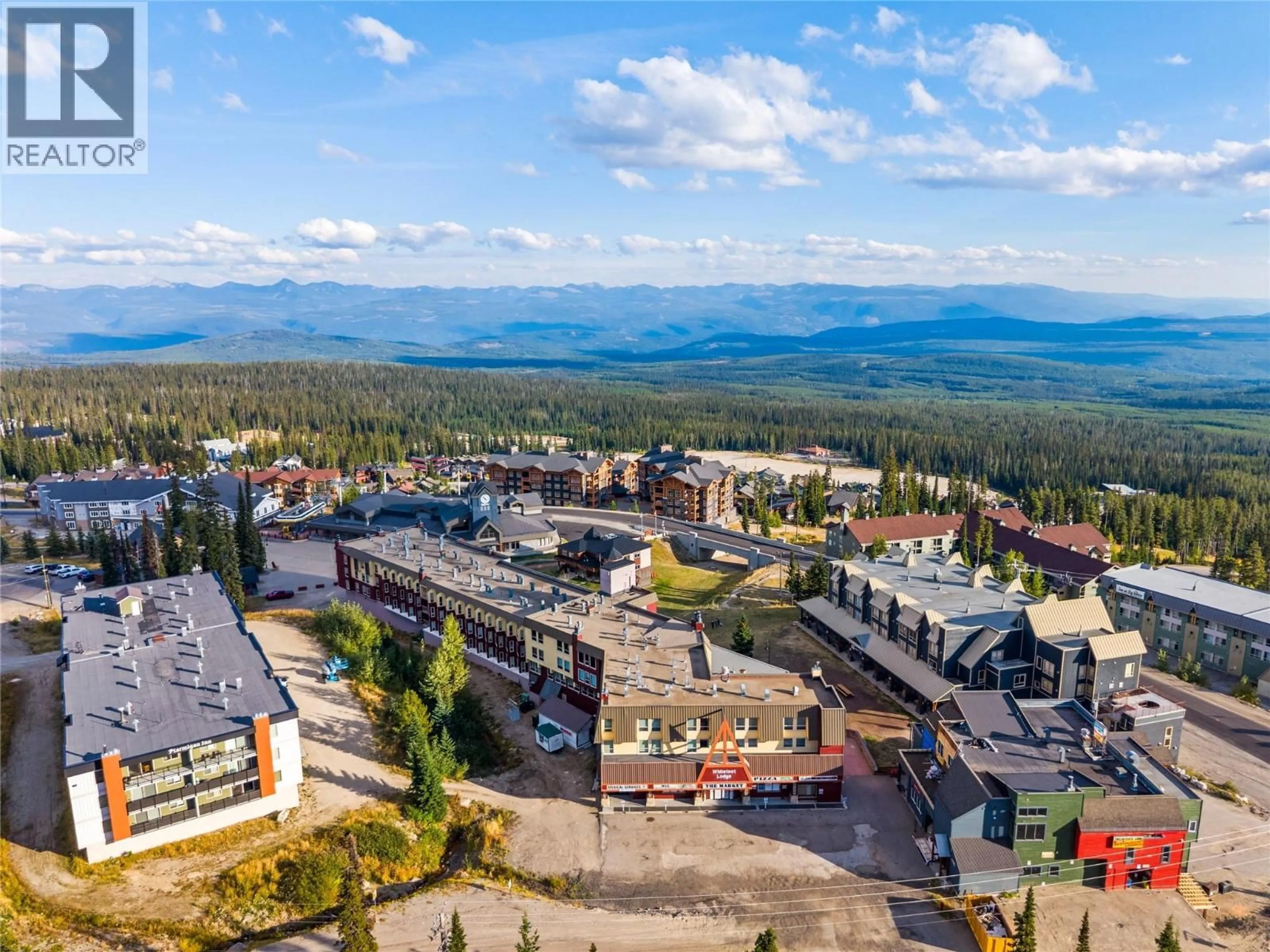 A pic from outside/outdoor area/front of a property/back of a property/a pic from drone, mountain view for 204 - 5375 BIG WHITE ROAD, Big White British Columbia V1P1T4