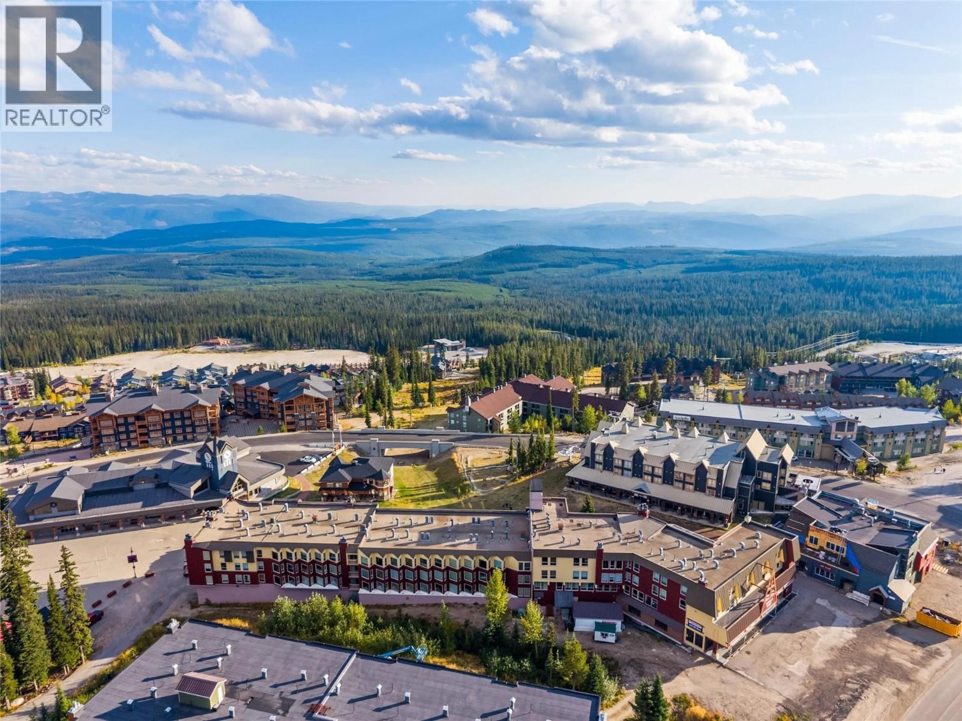 A pic from outside/outdoor area/front of a property/back of a property/a pic from drone, mountain view for 204 - 5375 BIG WHITE ROAD, Big White British Columbia V1P1T4