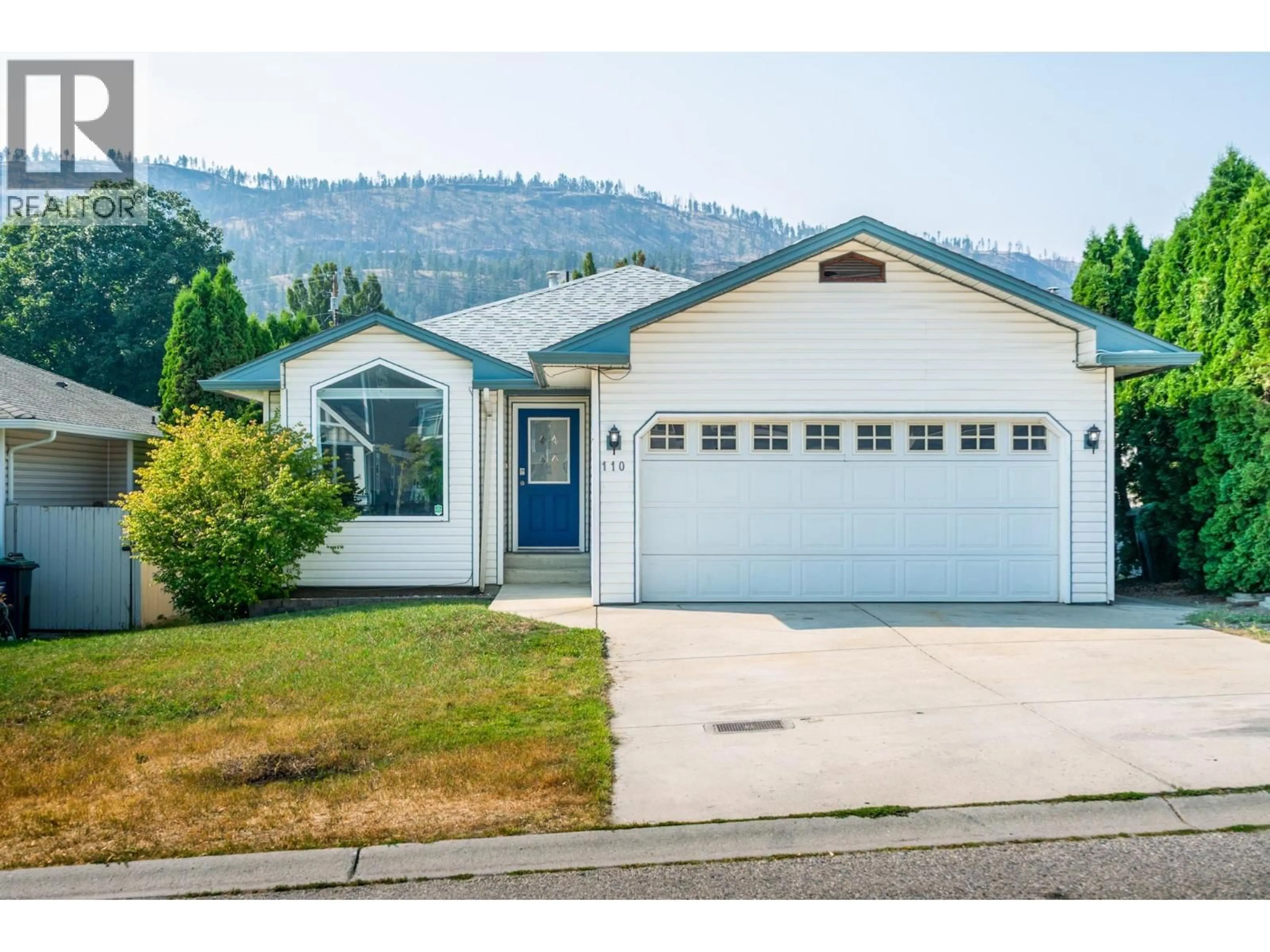 Home with vinyl exterior material, street for 110 WYNDHAM CRESCENT, Kelowna British Columbia V1V1Z2