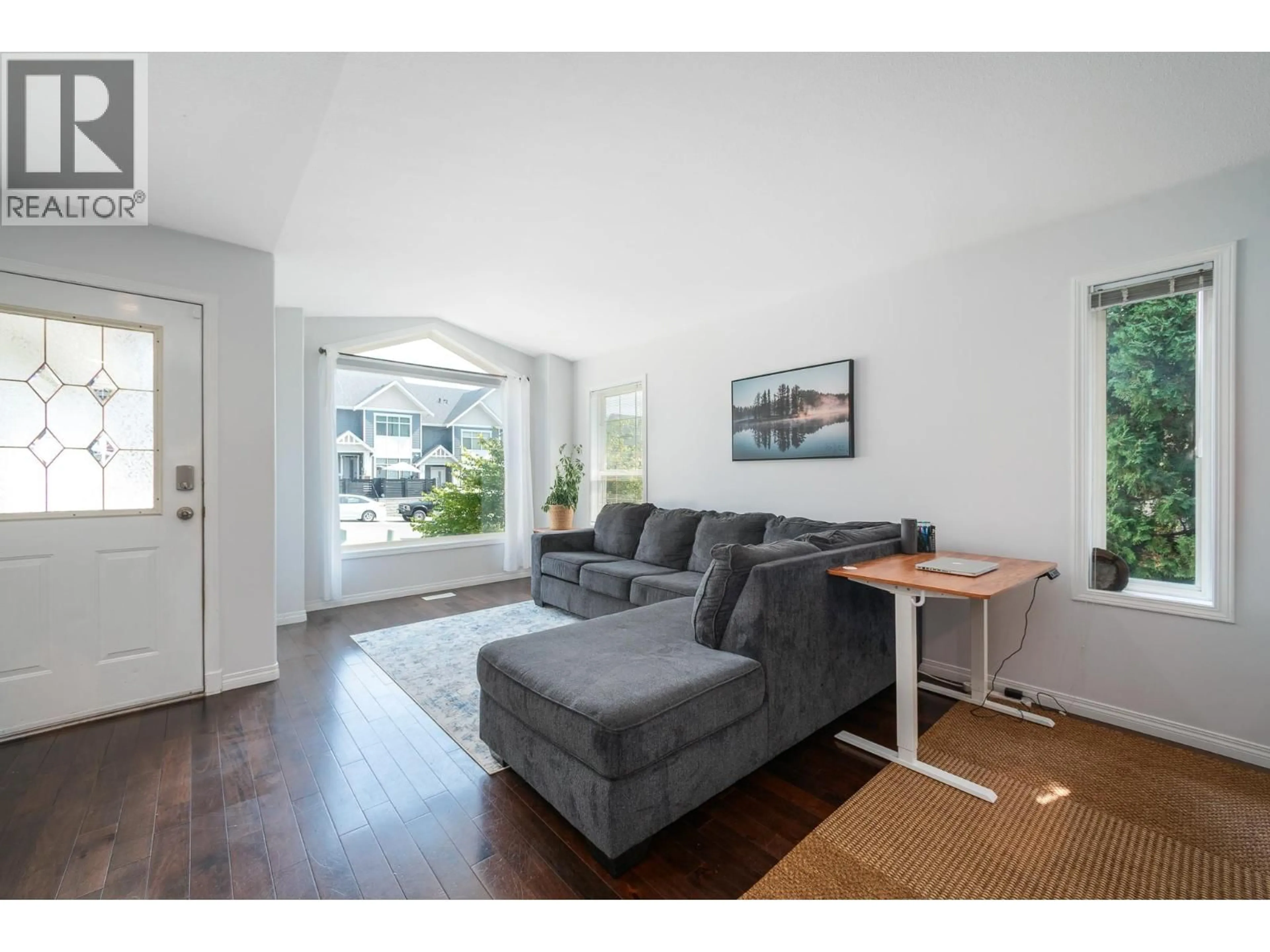 Living room with furniture, unknown for 110 WYNDHAM CRESCENT, Kelowna British Columbia V1V1Z2